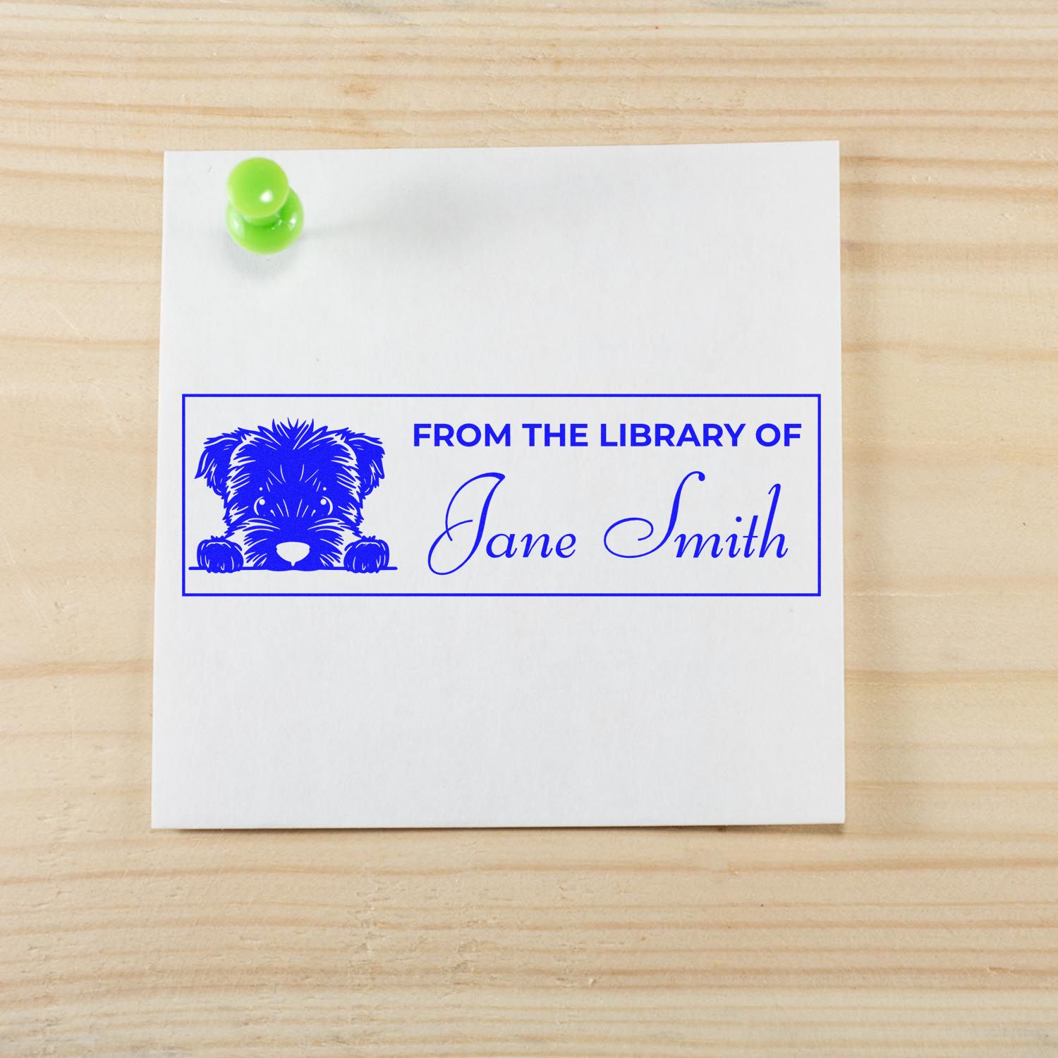 Custom personalized rubber stamp with dog design and From the Library of Jane Smith text for books and libraries.