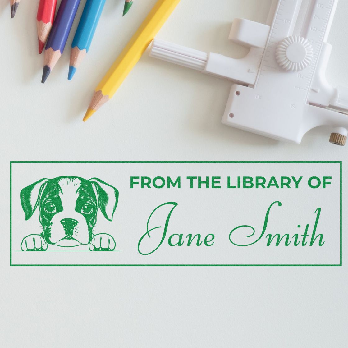 Custom library rubber stamp with puppy design and personalized name, featuring From the Library of Jane Smith for books.