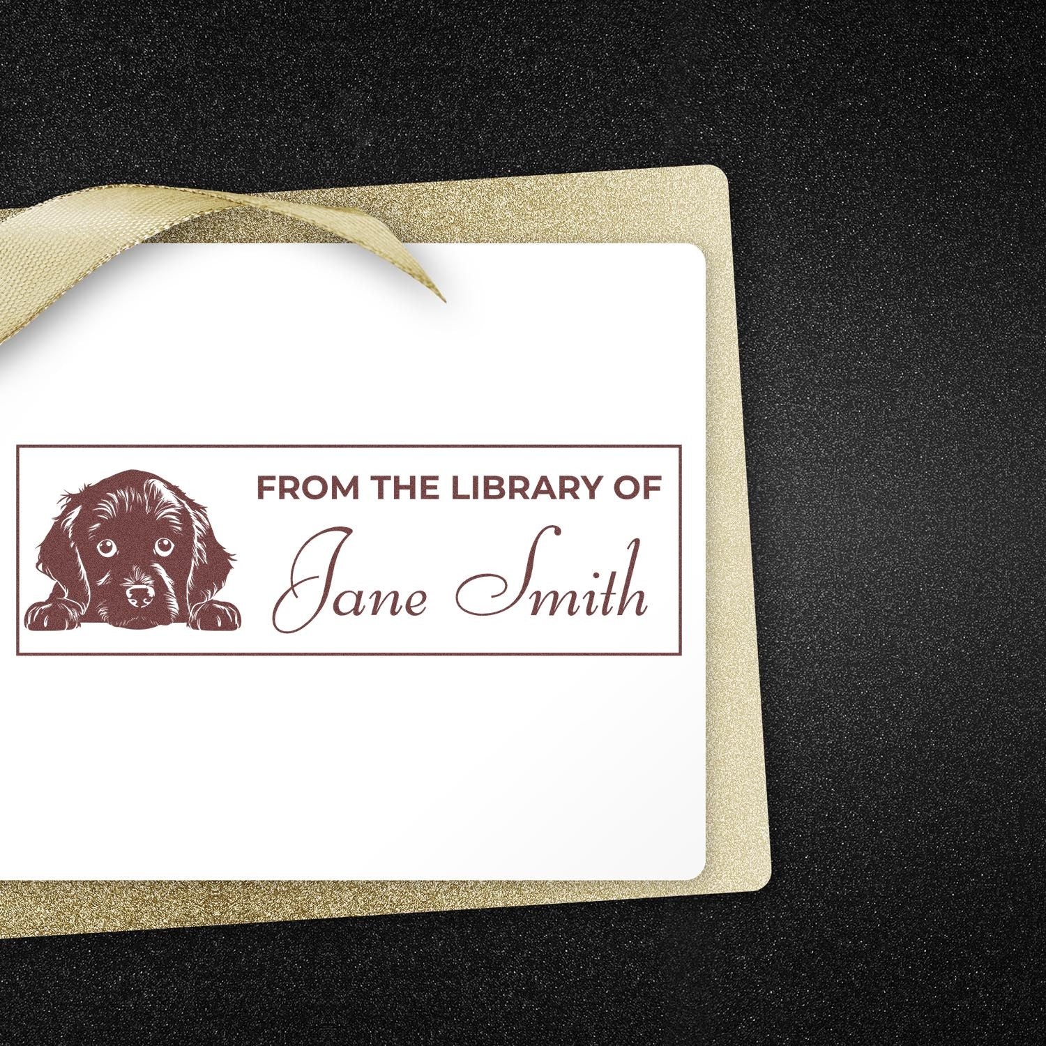 Custom dog bookplate rubber stamp reading From the Library of Jane Smith for personalized book labeling.
