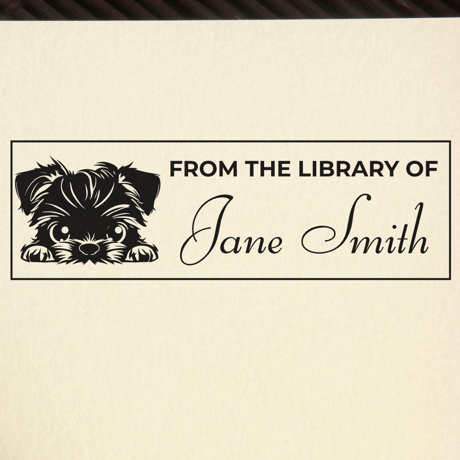 Personalized ex libris rubber stamp with dog illustration and Jane Smith name for marking library books.