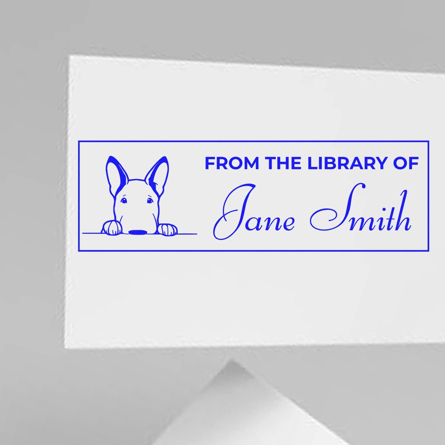 Custom personalized library book stamp with dog illustration, From the Library of Jane Smith text.