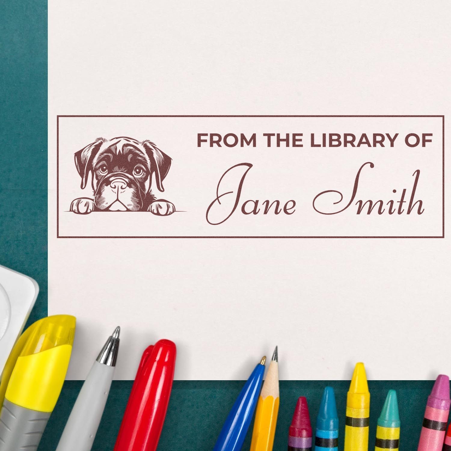 Custom rubber library stamp with dog illustration and From the Library of Jane Smith text for personalized books.