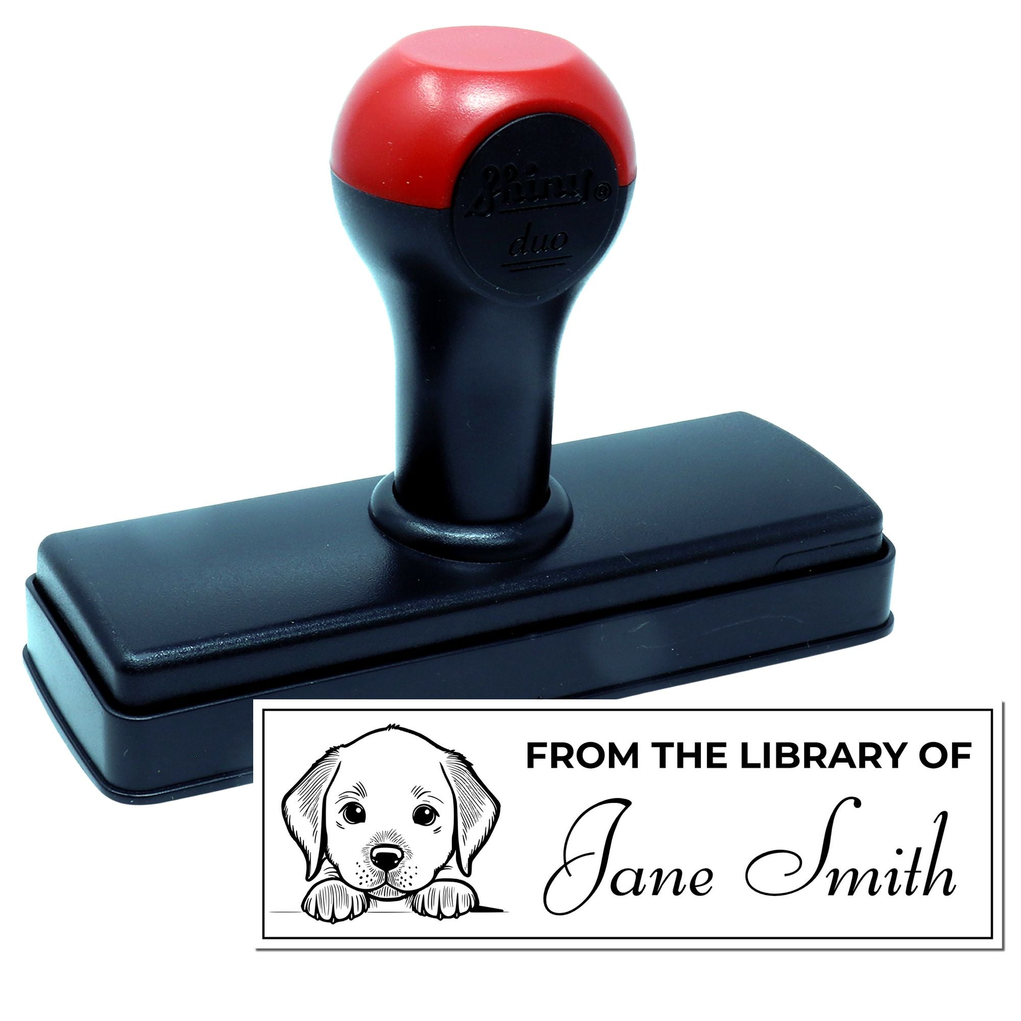 Custom self-inking library rubber stamp with puppy design and personalized From the Library of Jane Smith text.
