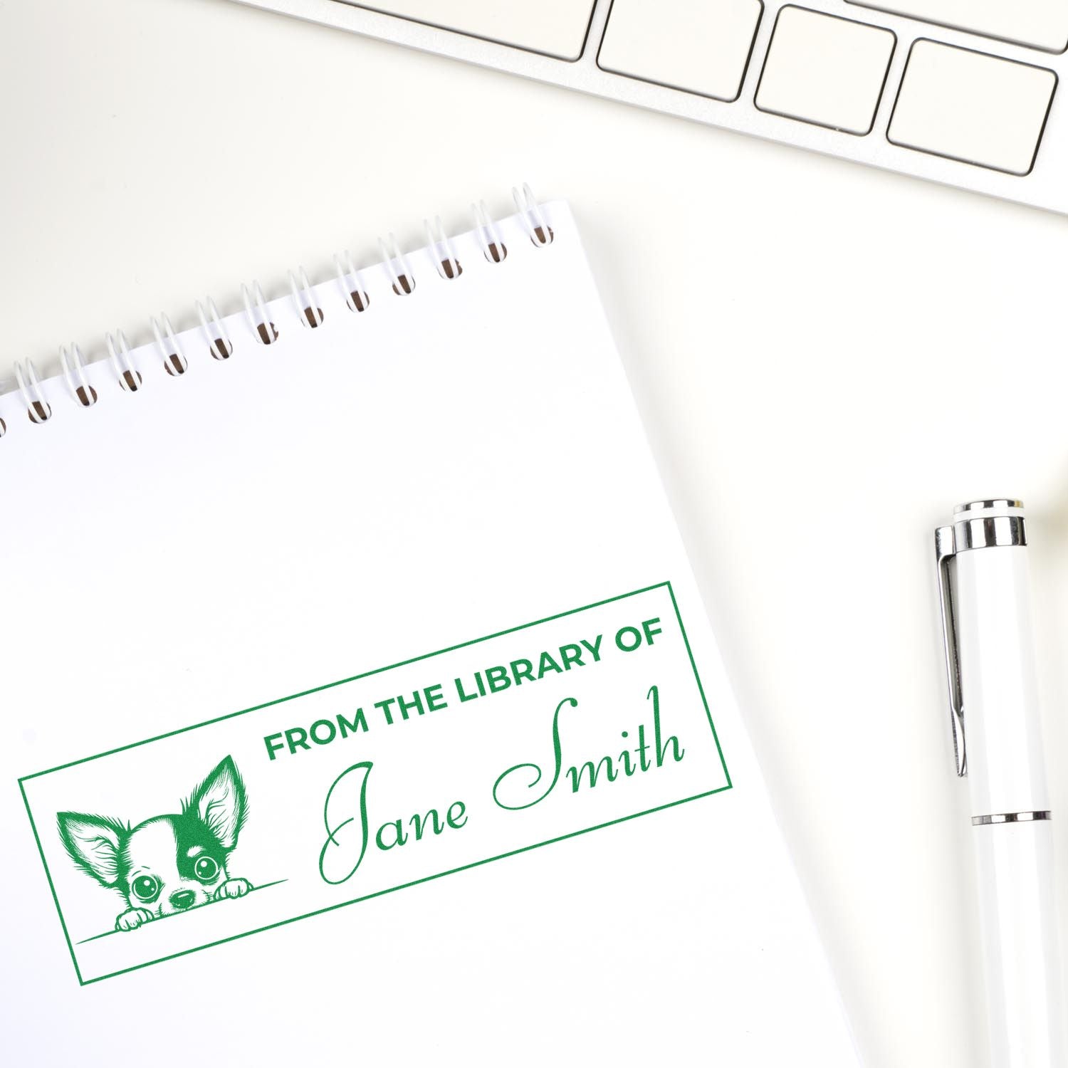 Custom rubber library stamp with dog design and Jane Smith name, perfect for personalized book ownership labeling.