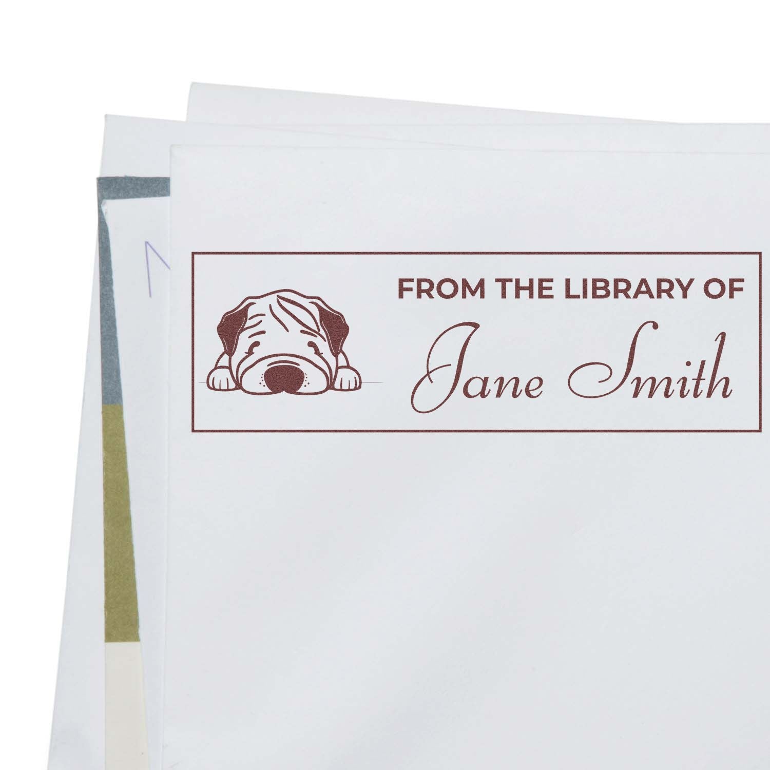 Custom rubber library stamp with sleeping dog design and From the Library of Jane Smith text for personalized bookplates.