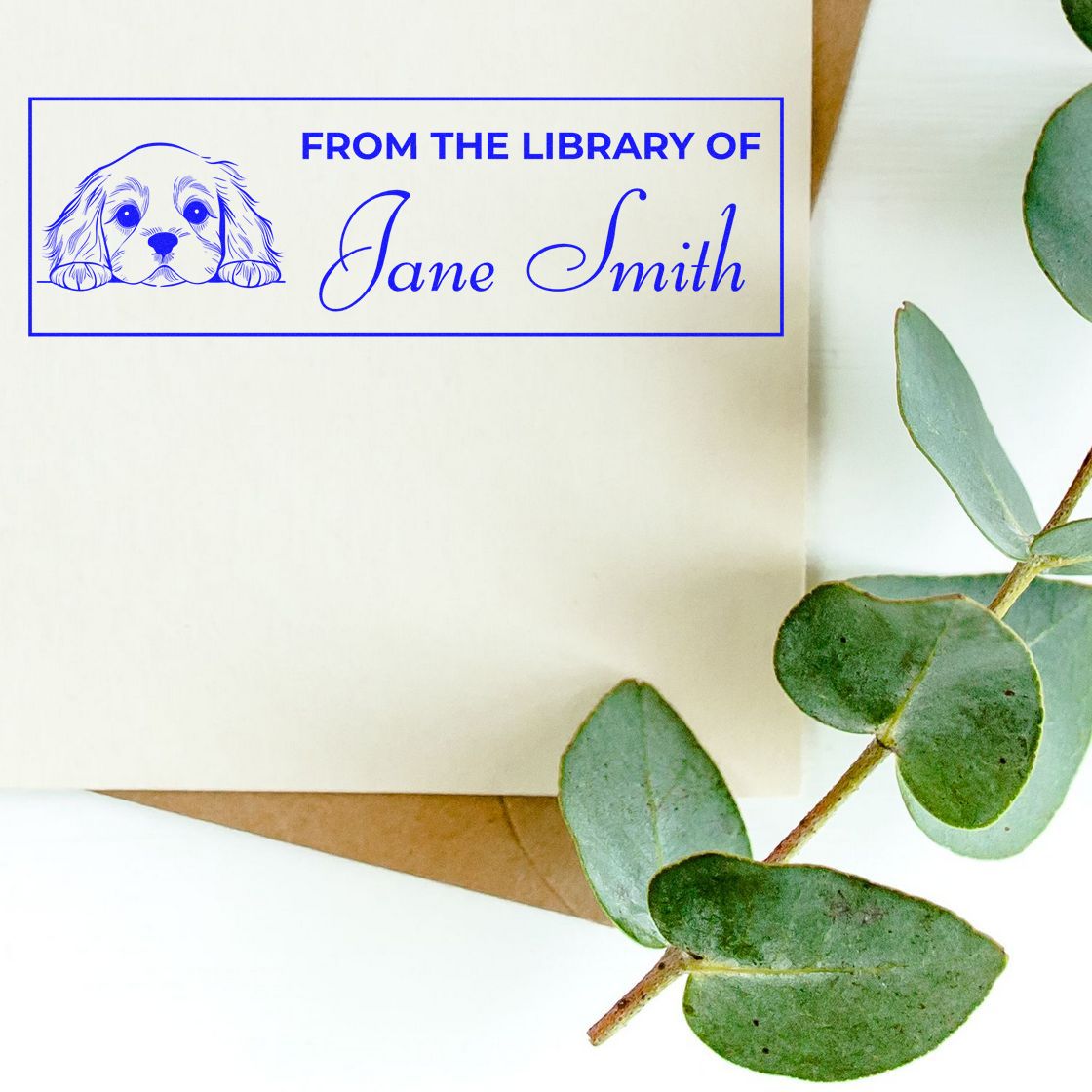 Custom dog library rubber stamp reading From the Library of Jane Smith for personalized books and stationery.