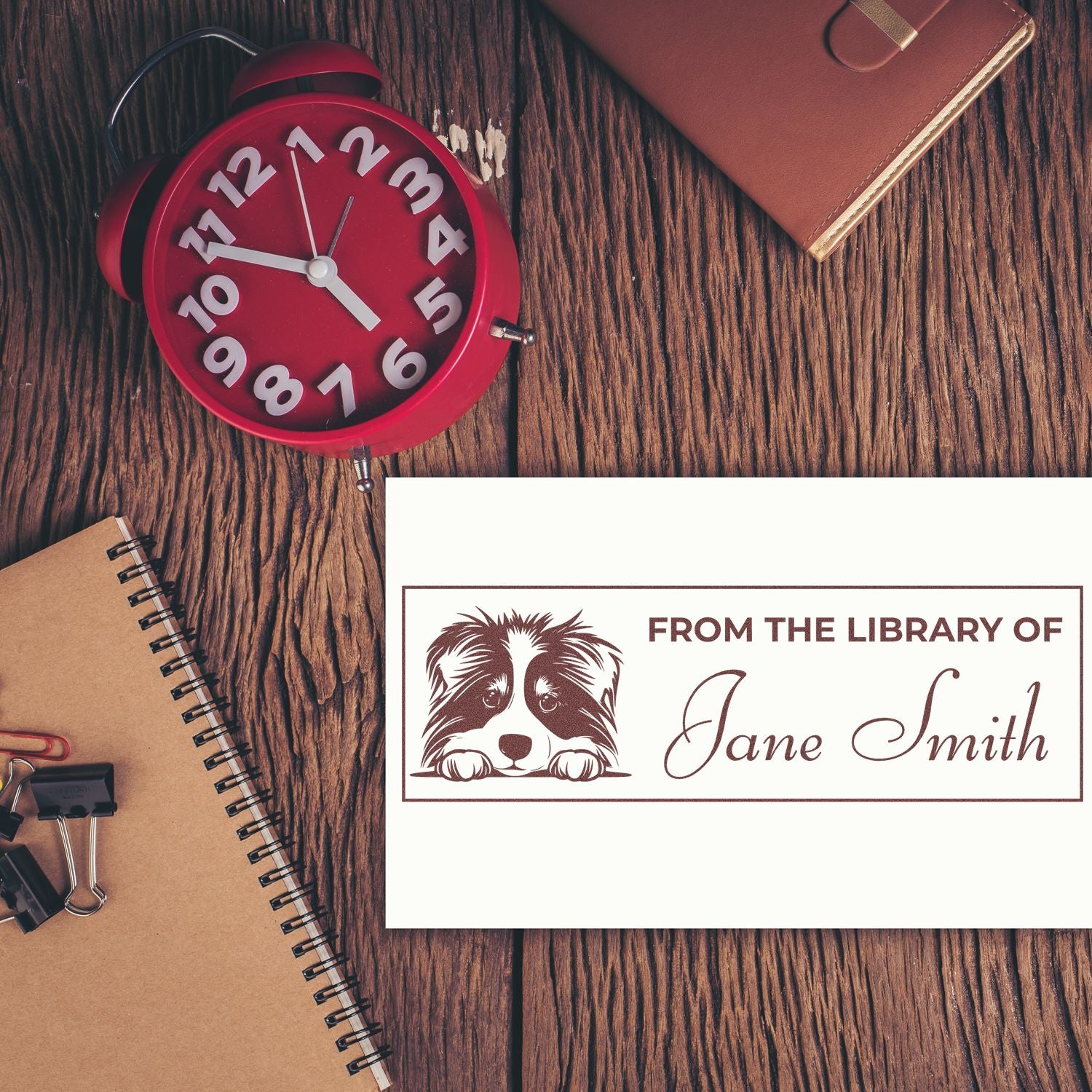 Custom library rubber stamp with dog illustration and personalized From the Library of Jane Smith bookplate design.