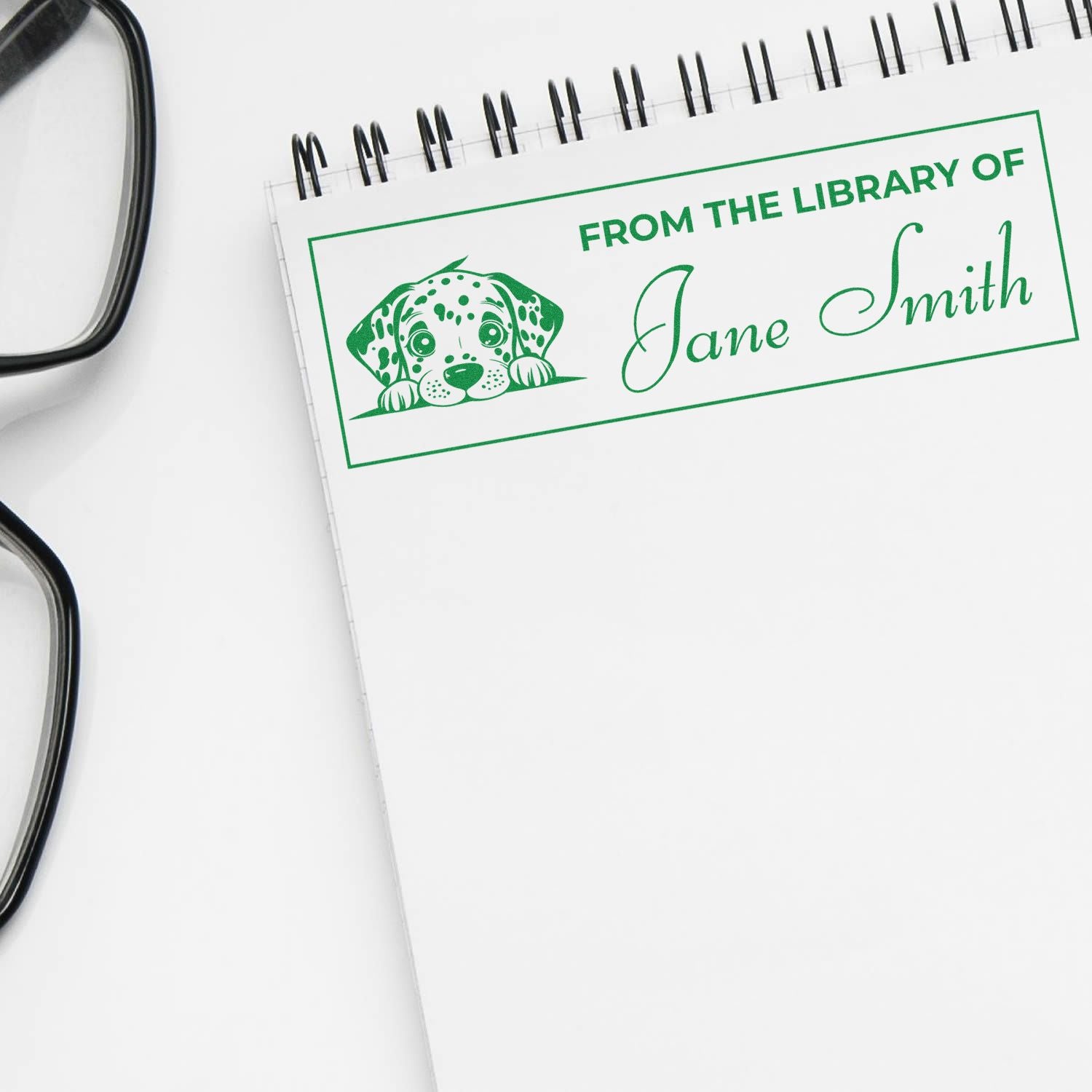 Custom bookplate rubber stamp with puppy art and From the Library of Jane Smith personalizes books.