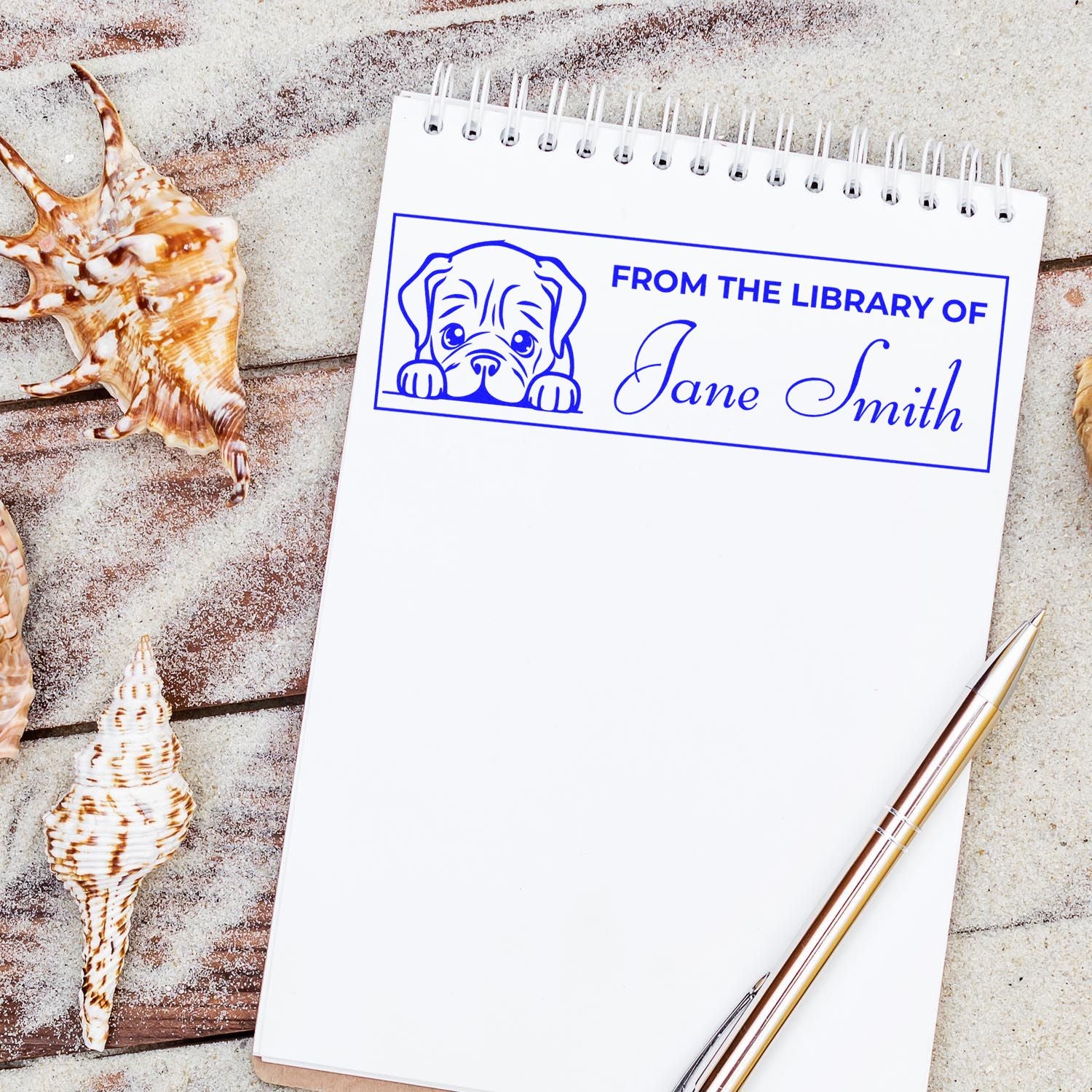 Personalized library rubber stamp with puppy design and From the Library of Jane Smith text for book ownership marking.