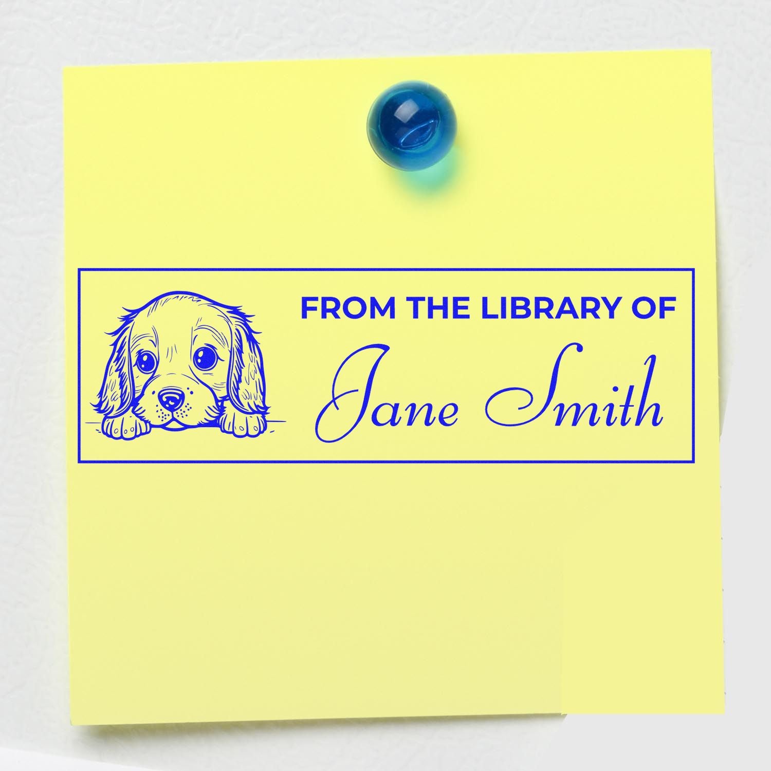 Personalized rubber library stamp with dog illustration and From the Library of Jane Smith bookplate design.