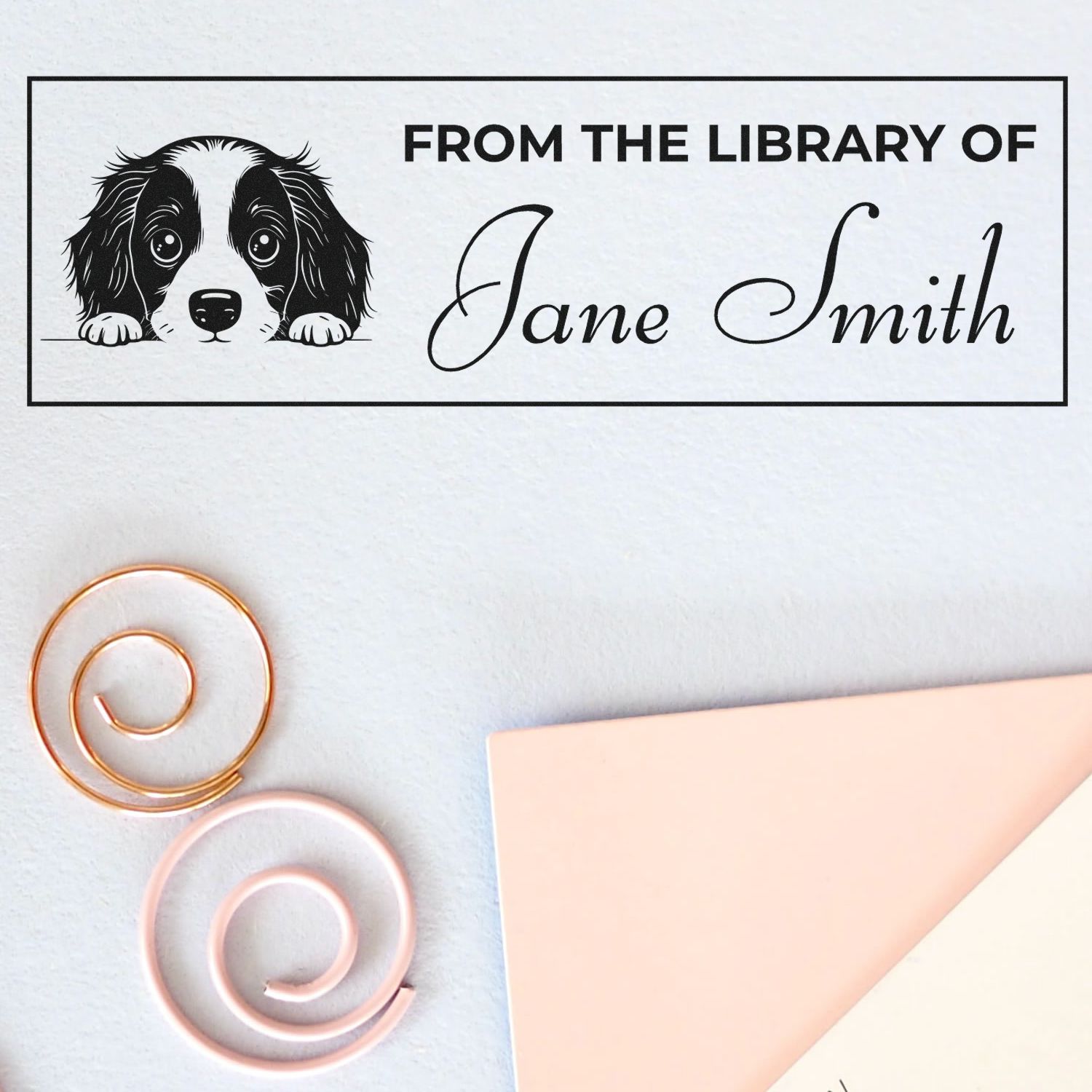 Custom library rubber stamp with dog illustration and Jane Smith name, personalized book ownership stamp