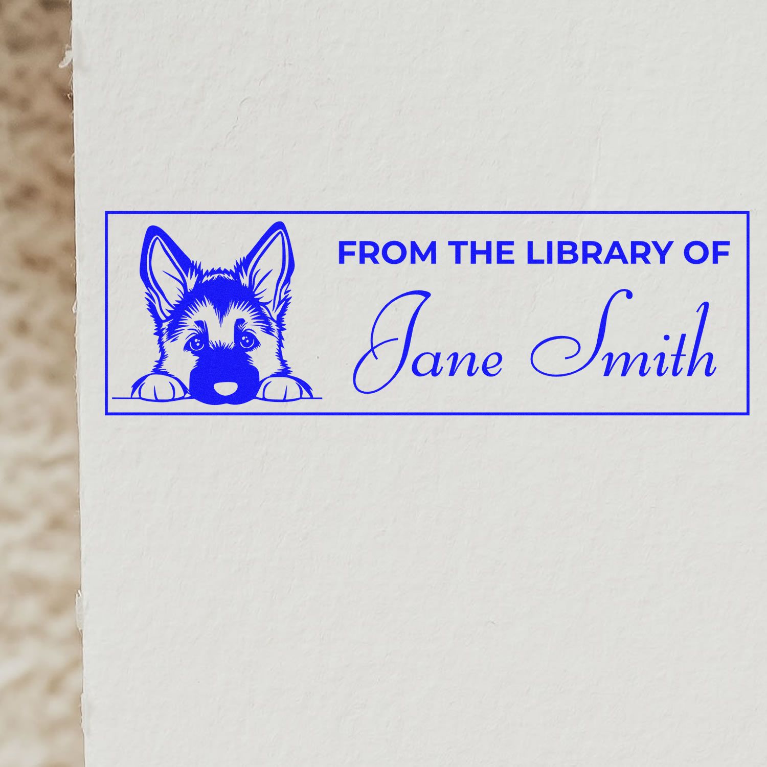 Custom rubber library stamp with dog illustration and From the Library of Jane Smith personalized book ex libris.