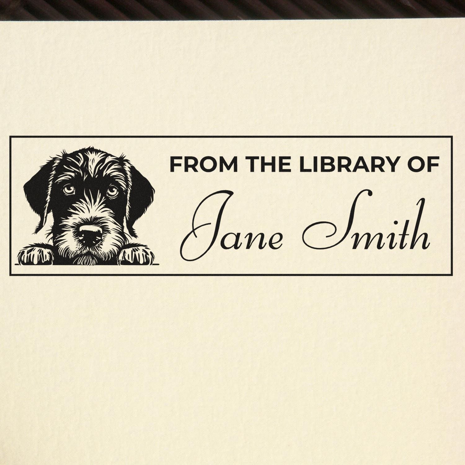 Personalized library rubber stamp with puppy illustration and From the Library of Jane Smith bookplate design.