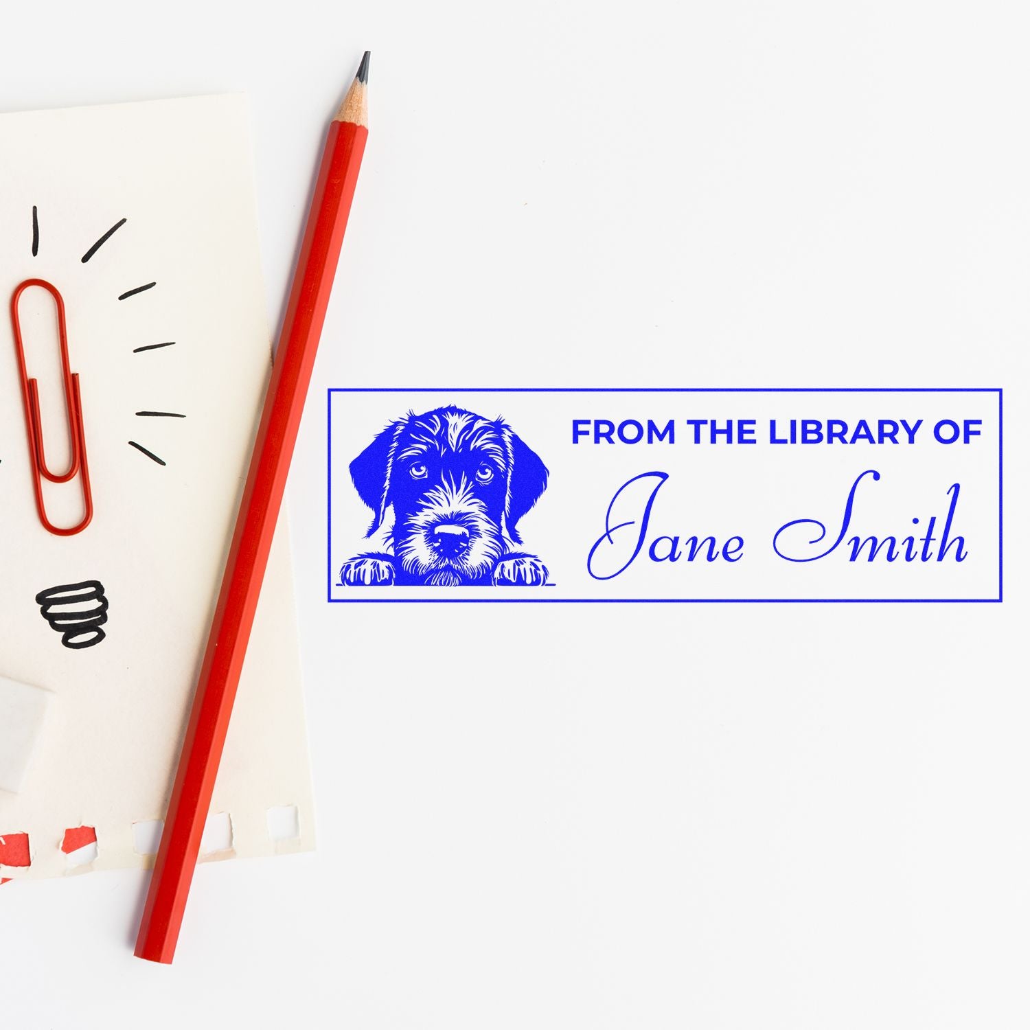 Custom rubber stamp for books reading From the Library of Jane Smith with dog illustration for personal library branding.