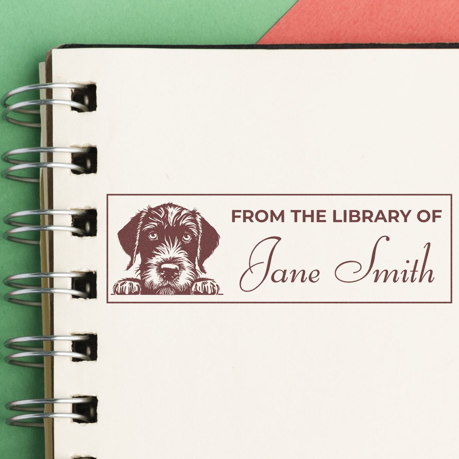 Personalized rubber library stamp with dog illustration and Jane Smith name for custom bookplates and stationery.