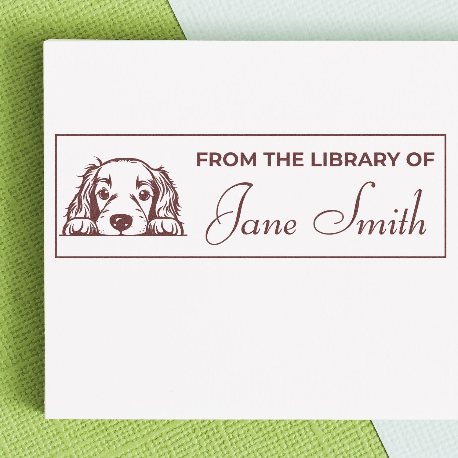 Personalized bookplate rubber stamp with dog illustration and From the Library of Jane Smith text for custom books.