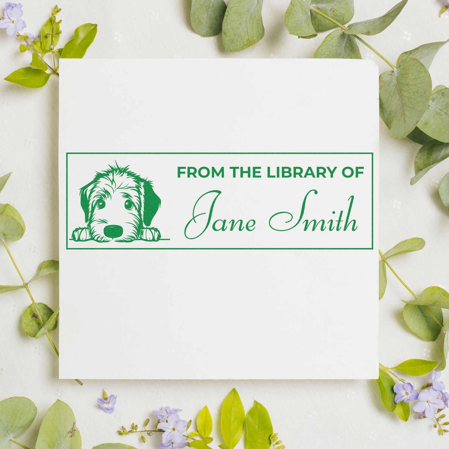 Custom dog library rubber stamp with From the Library of Jane Smith text for personalized bookplate marking.