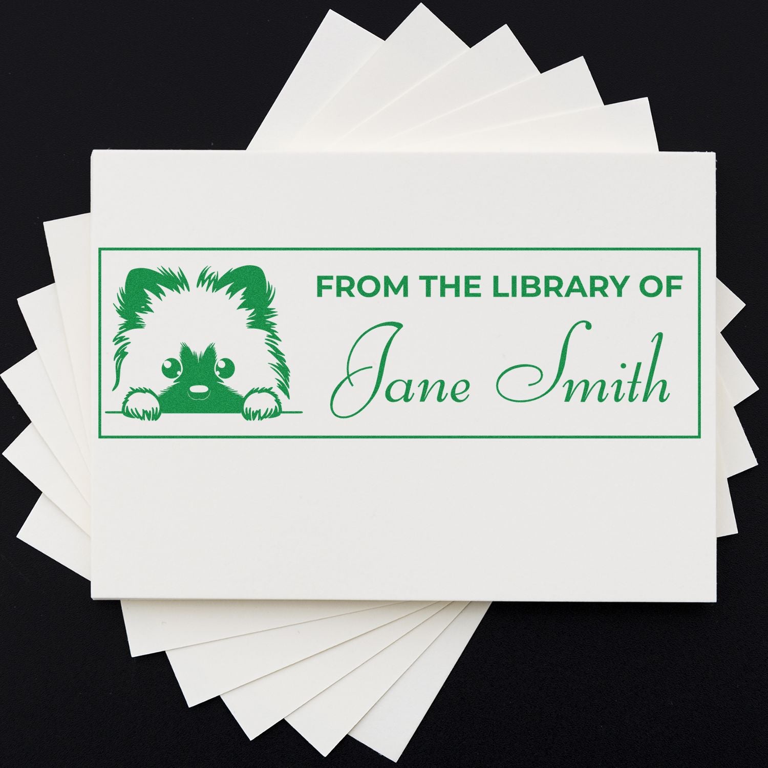 Personalized library rubber stamp with dog design and Jane Smith name for marking books and bookplates.