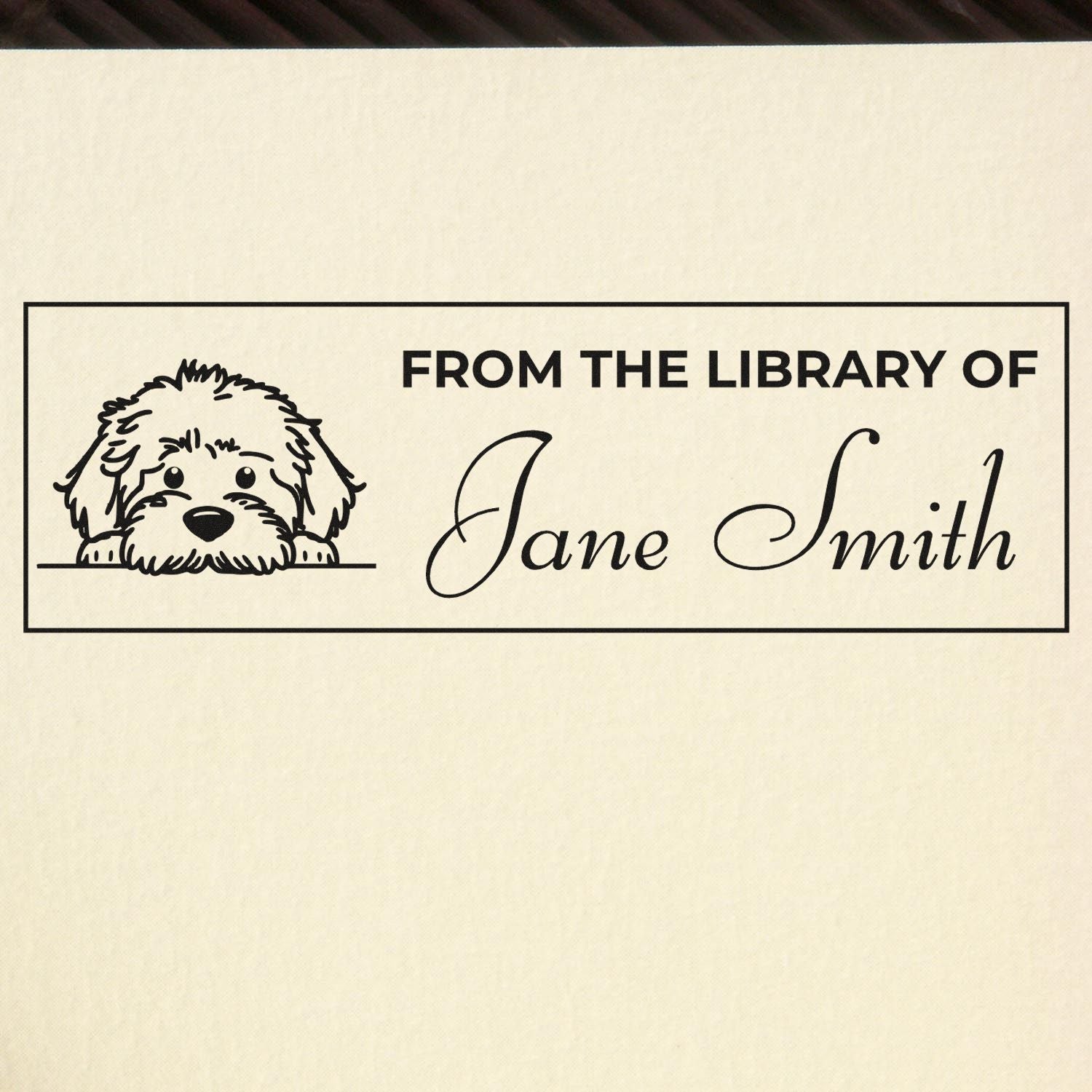Custom dog library stamp reading From the Library of Jane Smith for personalized ex libris book labeling.