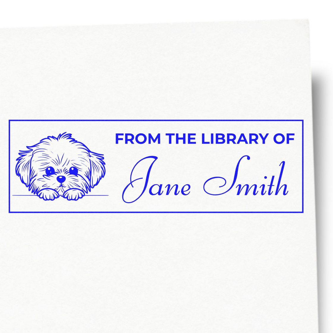 Personalized dog bookplate rubber stamp reading From the Library of Jane Smith for marking owned books.