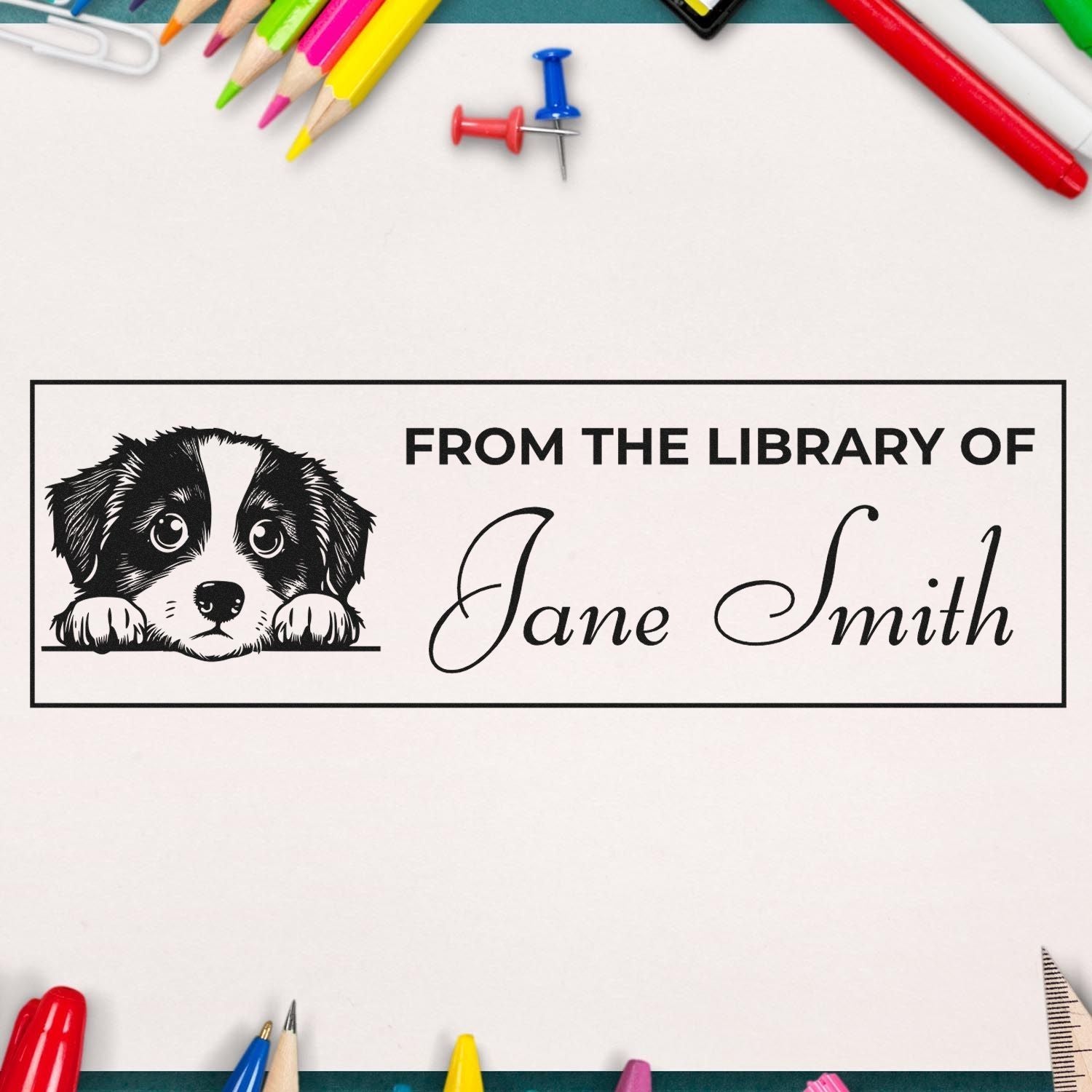 Personalized custom rubber stamp with puppy bookplate design and From the Library of Jane Smith text.
