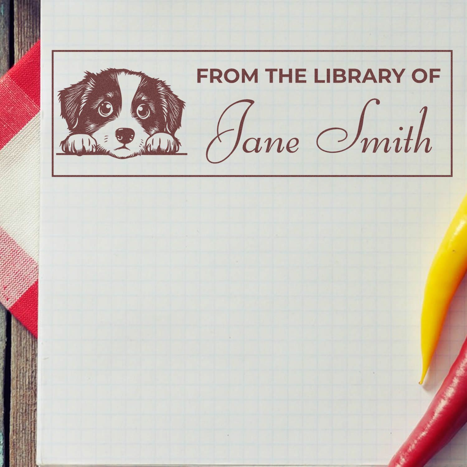 Custom rubber library stamp with dog illustration and personalized name, From the Library of Jane Smith, for books and stationery.