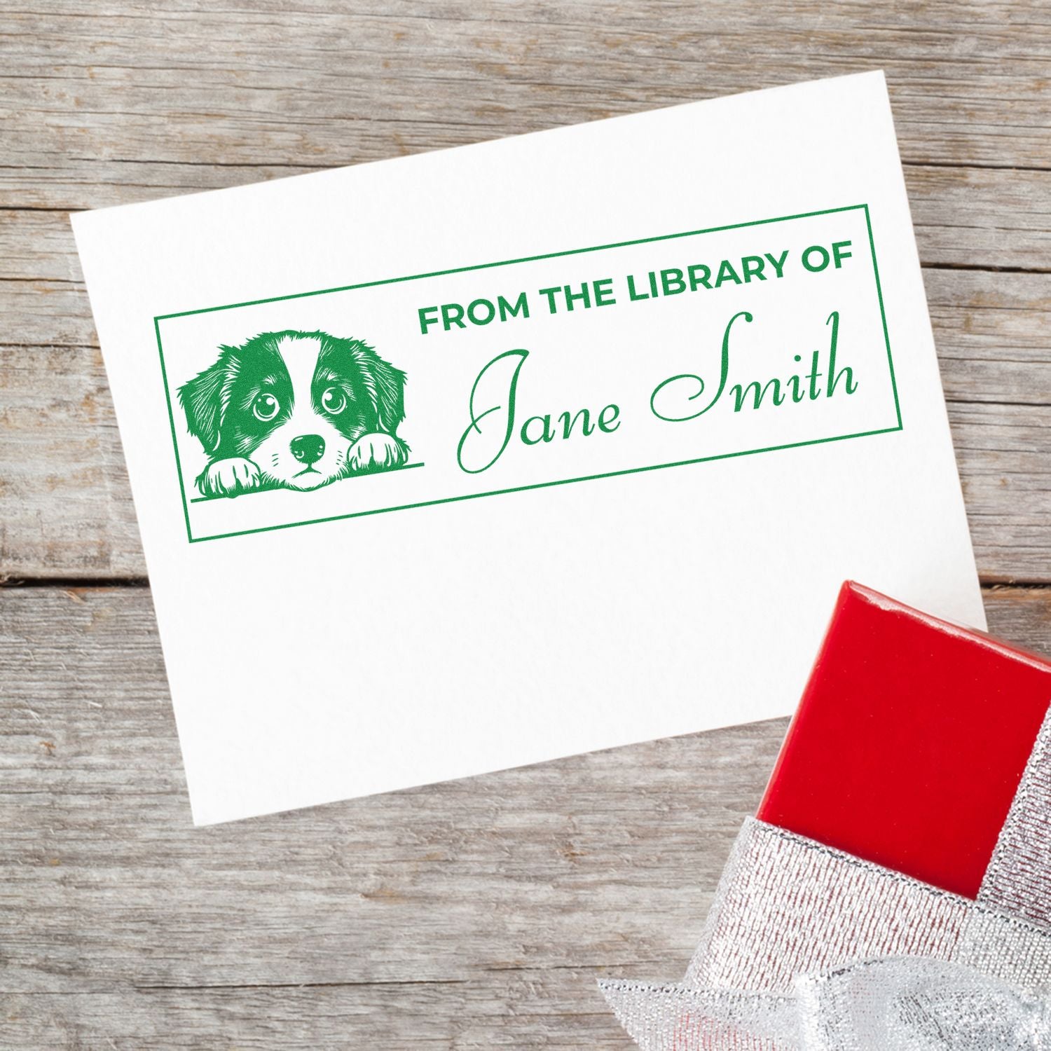 Custom library rubber stamp with puppy illustration and personalized From the Library of Jane Smith bookplate.