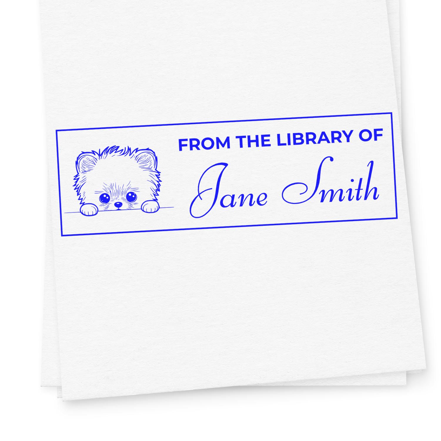 Custom From the Library of Jane Smith rubber stamp with cute puppy design for personalized book labeling.