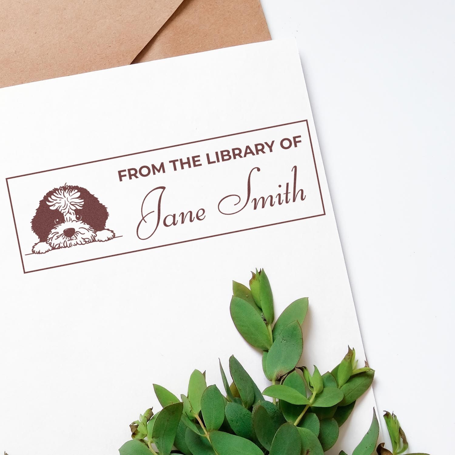 Custom rubber library stamp with dog illustration and From the Library of Jane Smith for personalized books.