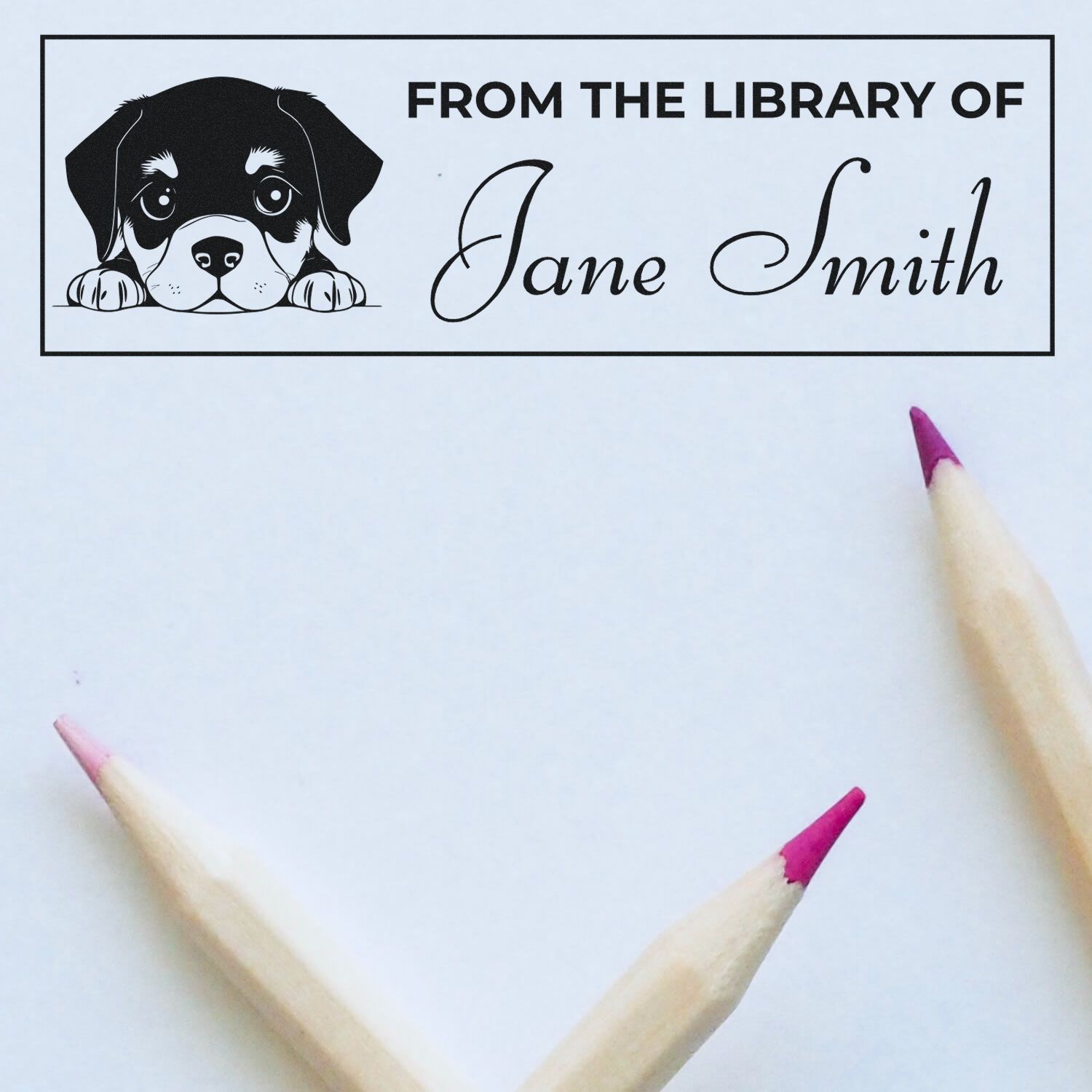 Custom rubber library stamp with puppy design and From the Library of Jane Smith for personalized book labeling.