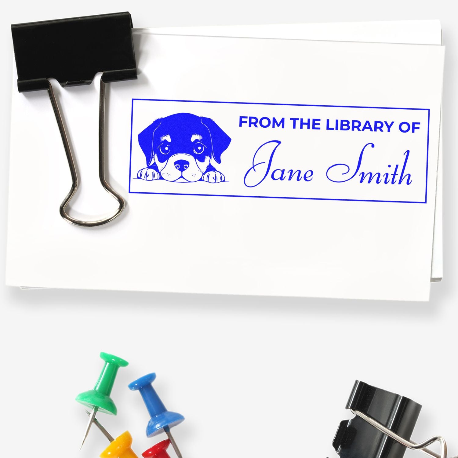 Custom dog-themed library rubber stamp for personalized bookplates, reading From the Library of Jane Smith.