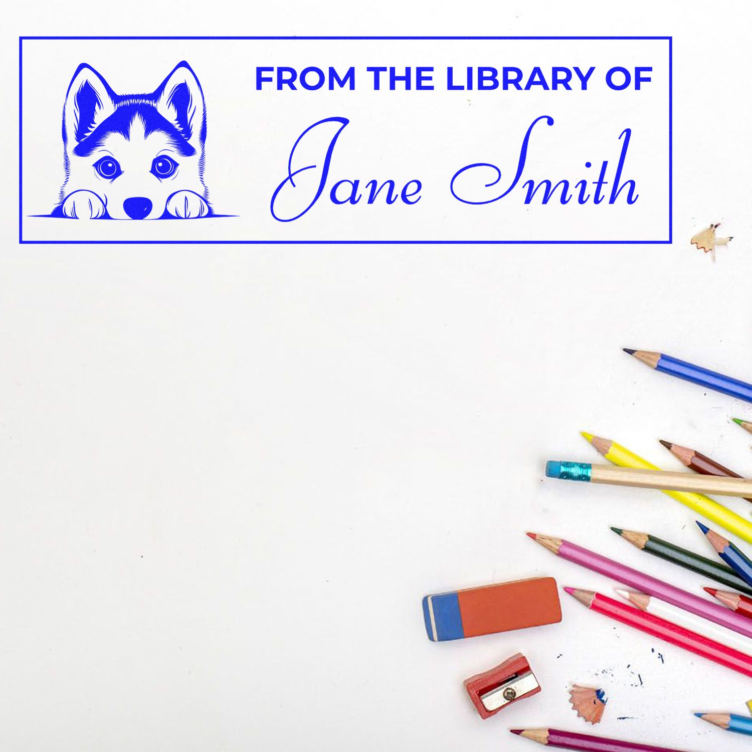 Custom rubber bookplate stamp reading From the Library of Jane Smith with husky dog design for personalized books.
