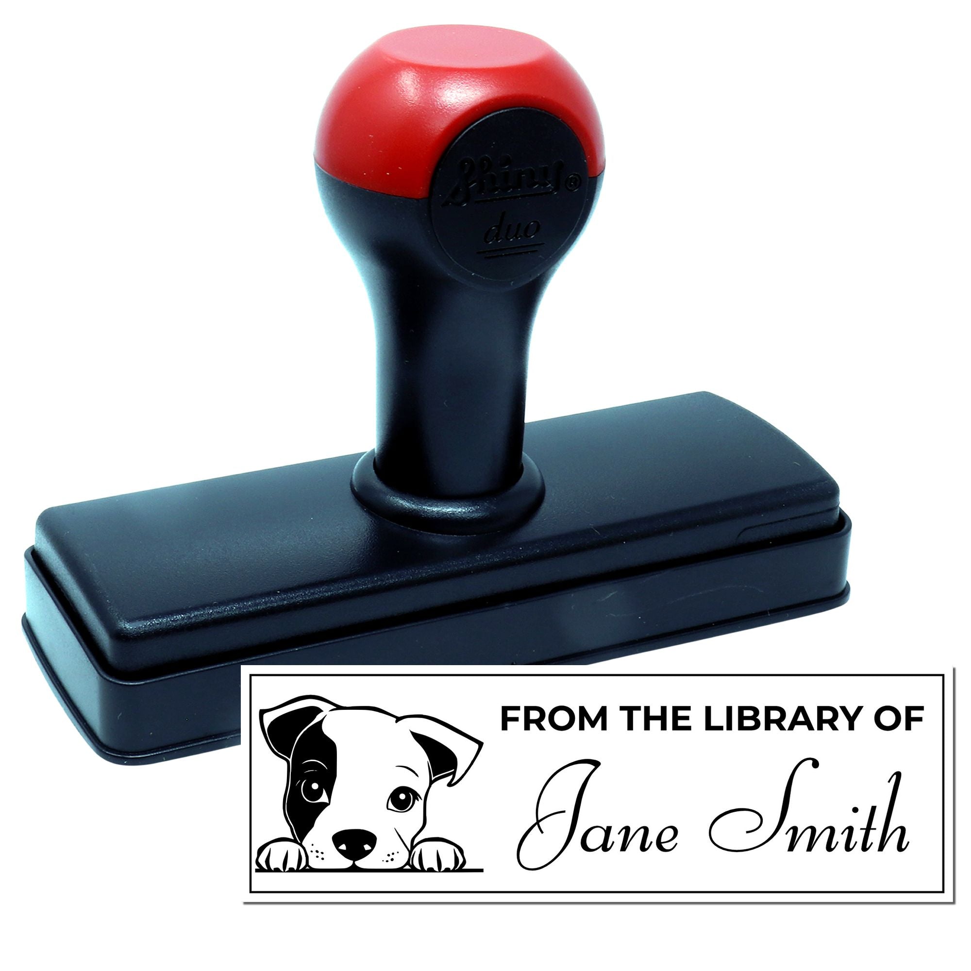 Custom self-inking rubber stamp for personalized library books, featuring dog artwork and From the Library of Jane Smith imprint.