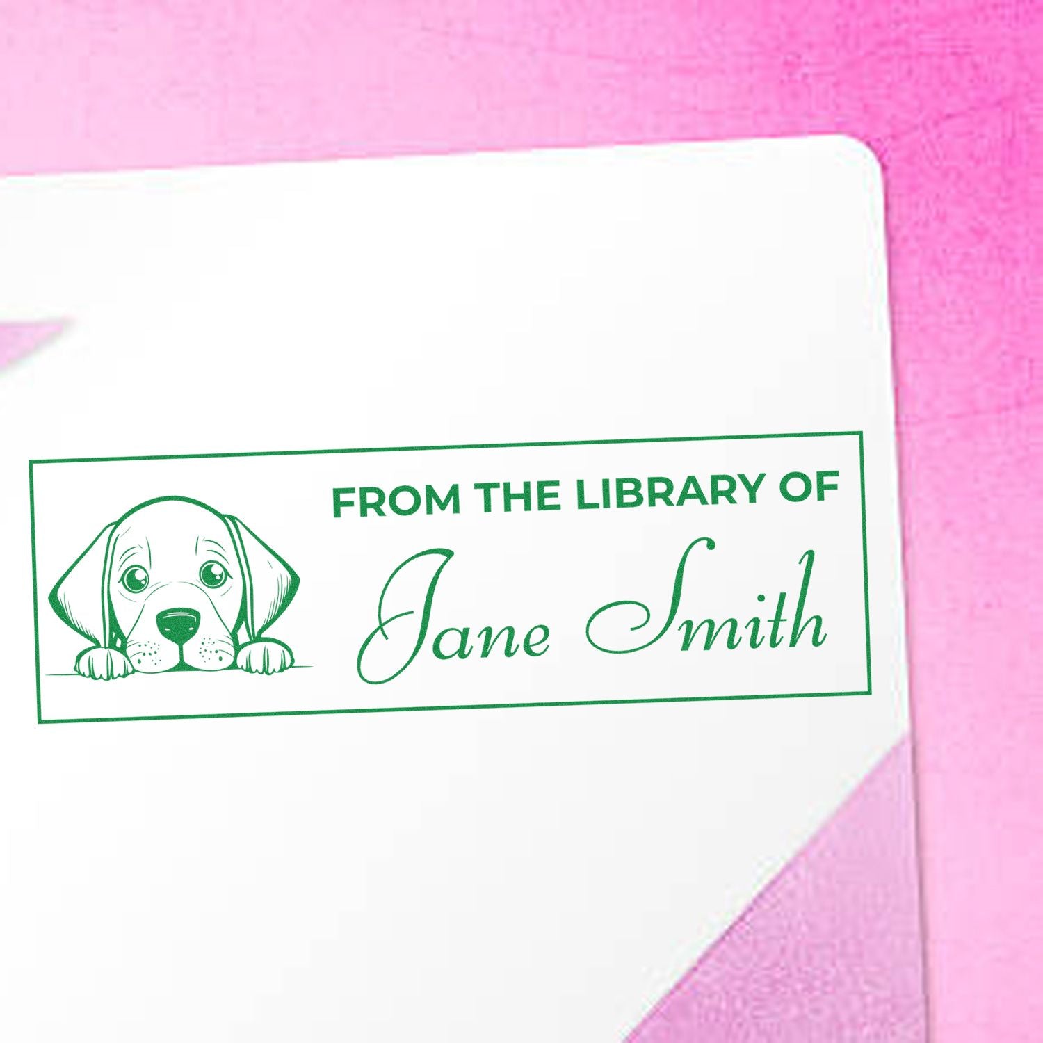 Personalized rubber library stamp with dog illustration and From the Library of Jane Smith for custom book labeling.