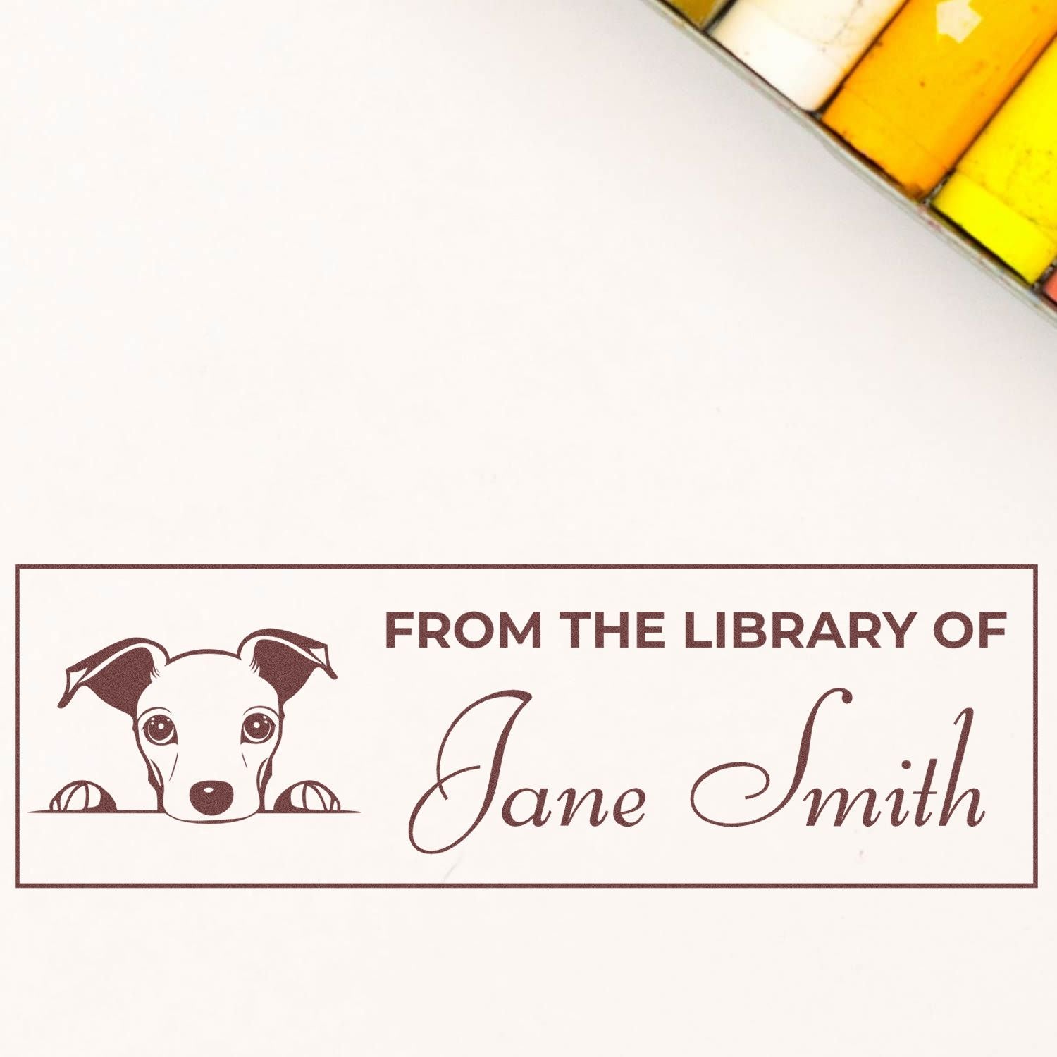 Custom dog library rubber stamp reading From the Library of Jane Smith for personalized books and stationery.
