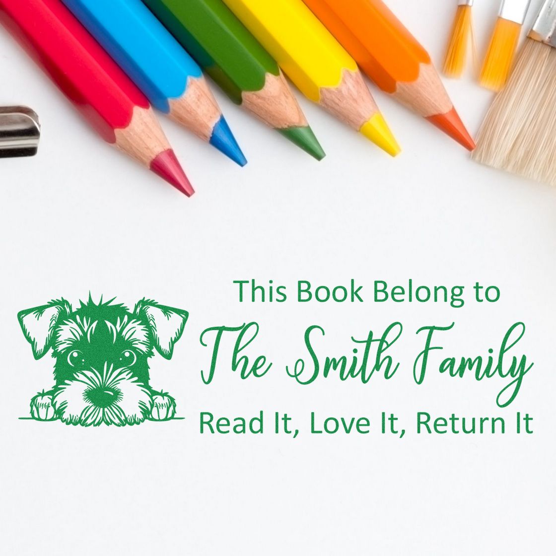 Custom rubber stamp bookplate design with dog illustration and This Book Belongs to The Smith Family return-it message.