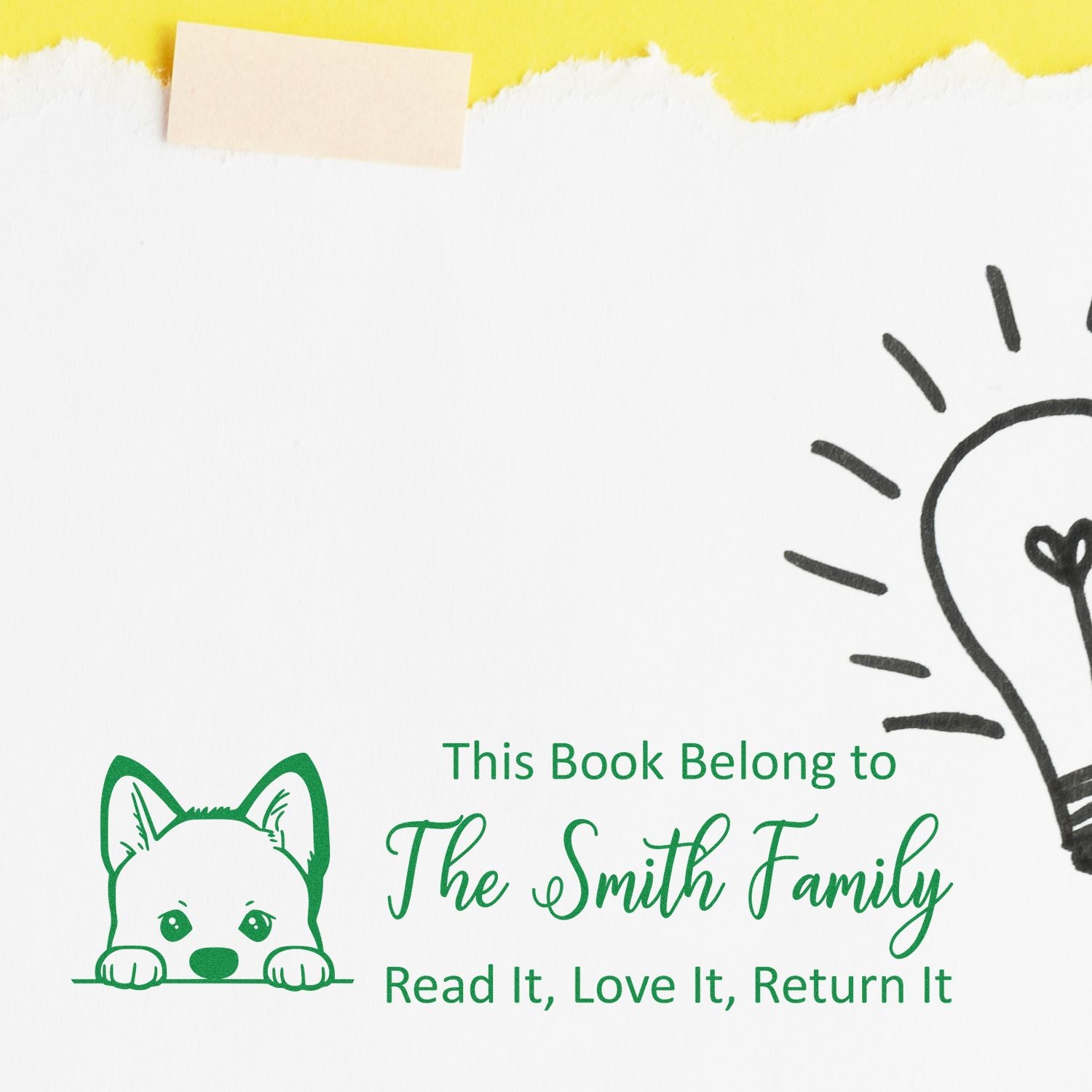 Personalized rubber book stamp with pet illustration and This Book Belong to The Smith Family return-to-library message.