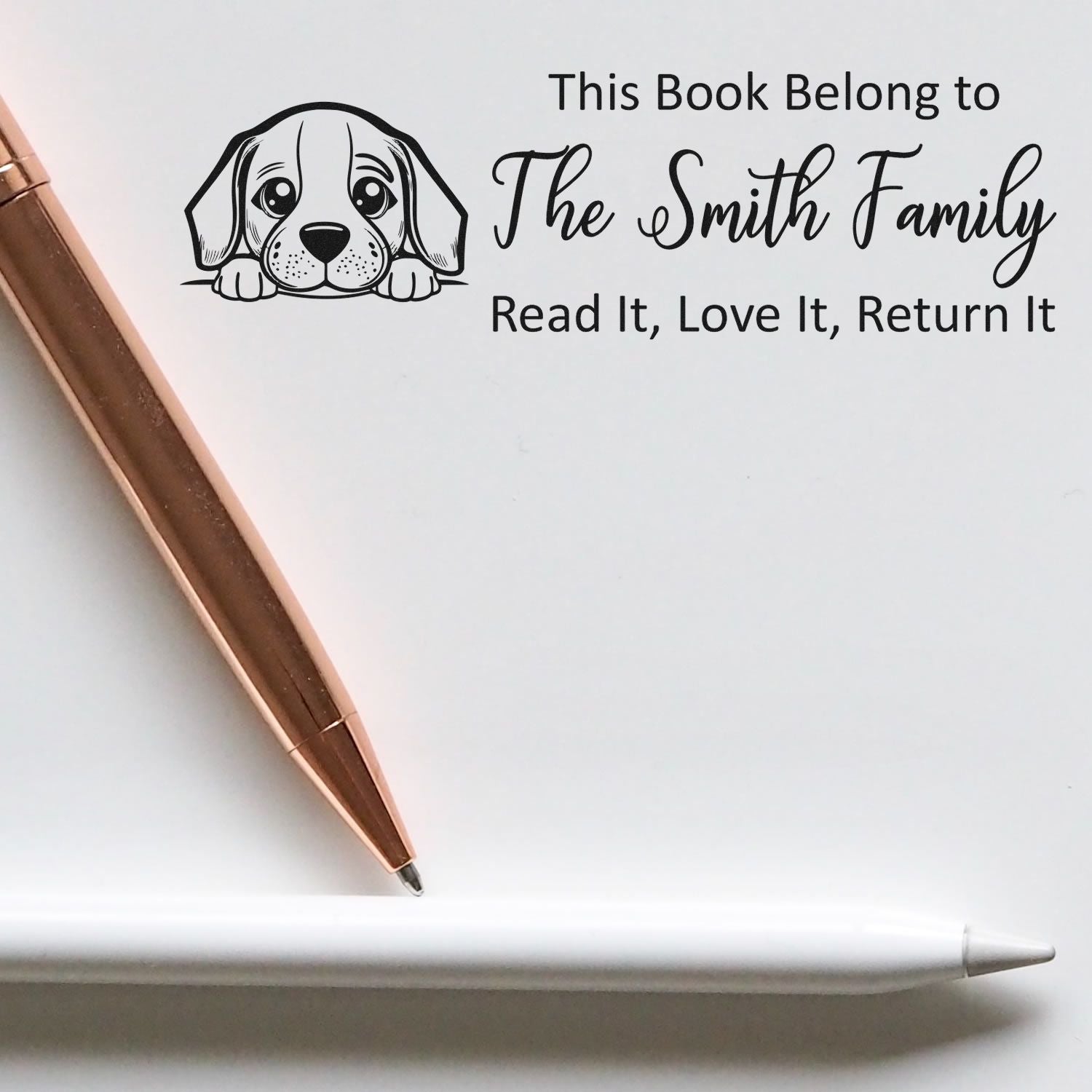 Personalized dog rubber stamp for the Smith Family, with Read It, Love It, Return It library ownership message.
