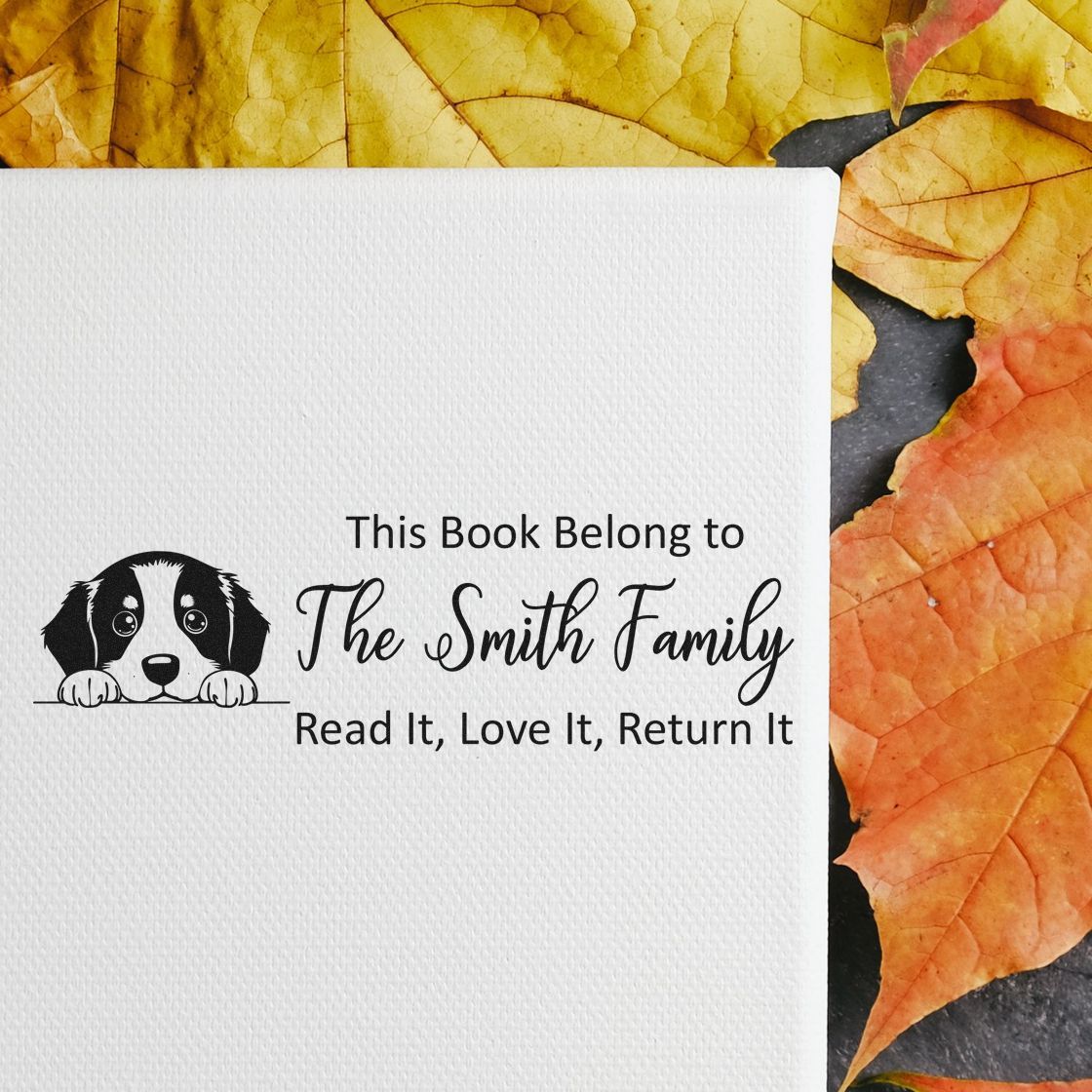 Personalized dog-themed bookplate rubber stamp for the Smith family, marking books with a read, love, return ownership message.