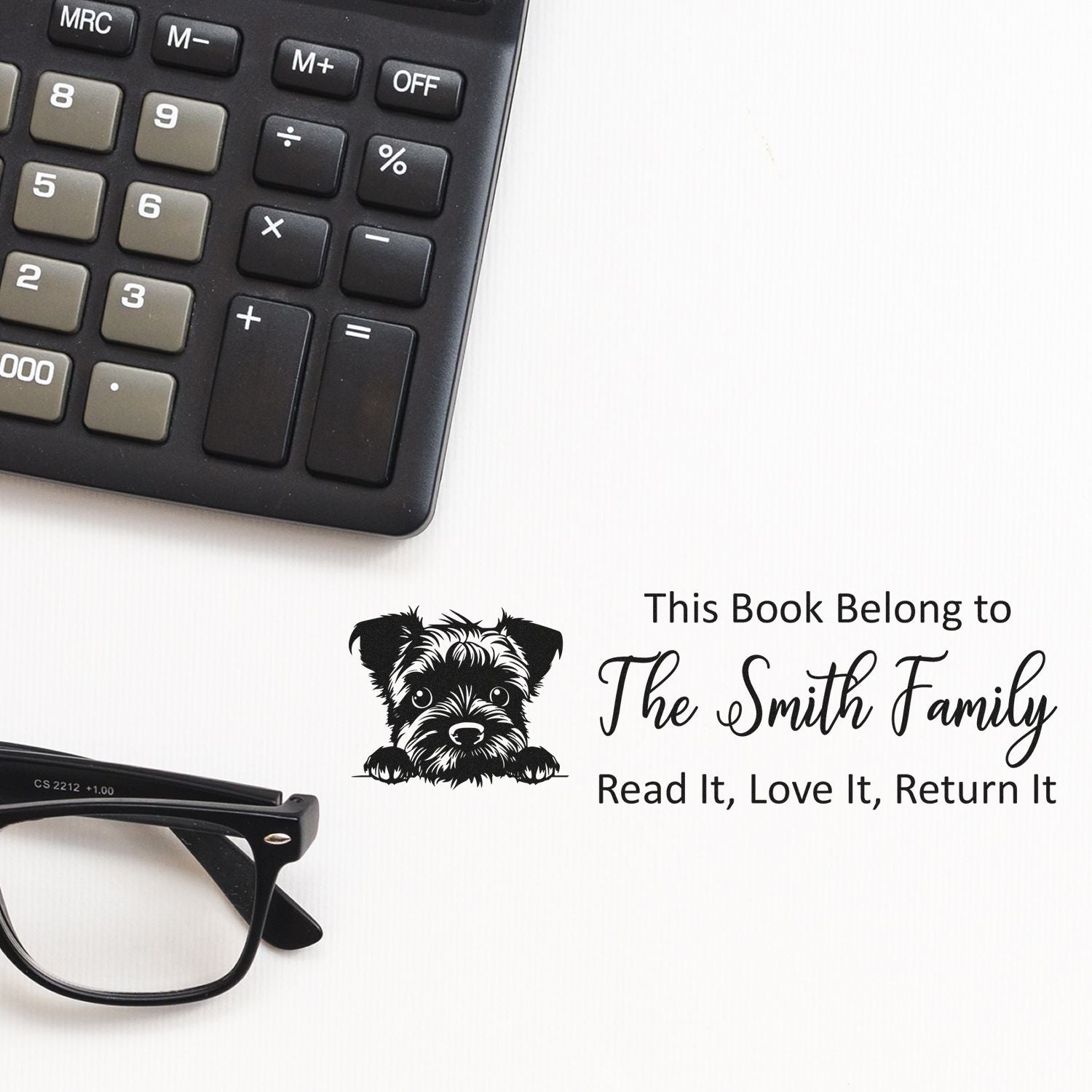 Personalized rubber book stamp for The Smith Family with dog icon and Read It, Love It, Return It library label.