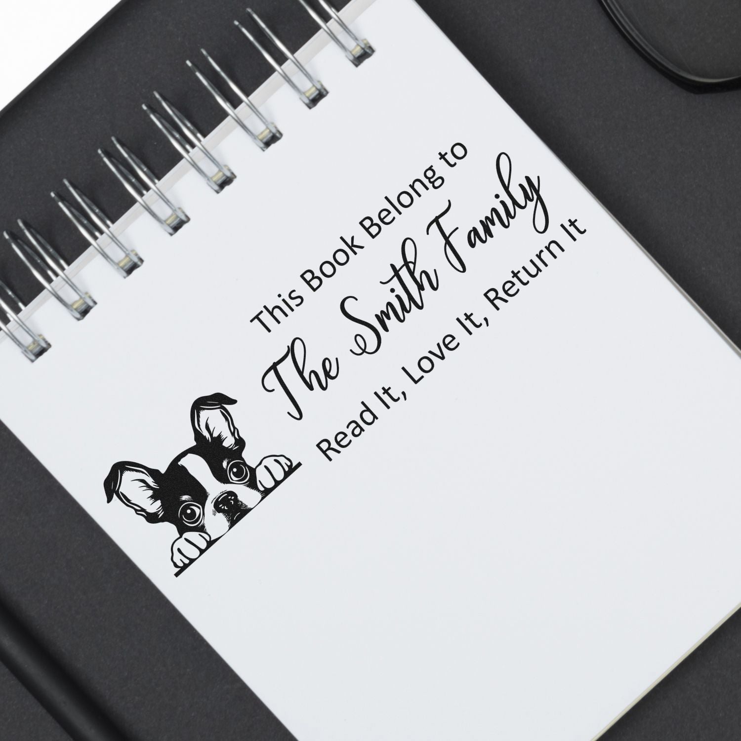 Personalized rubber stamp for books: This Book Belongs to The Smith Family, Read It, Love It, Return It with dog design.