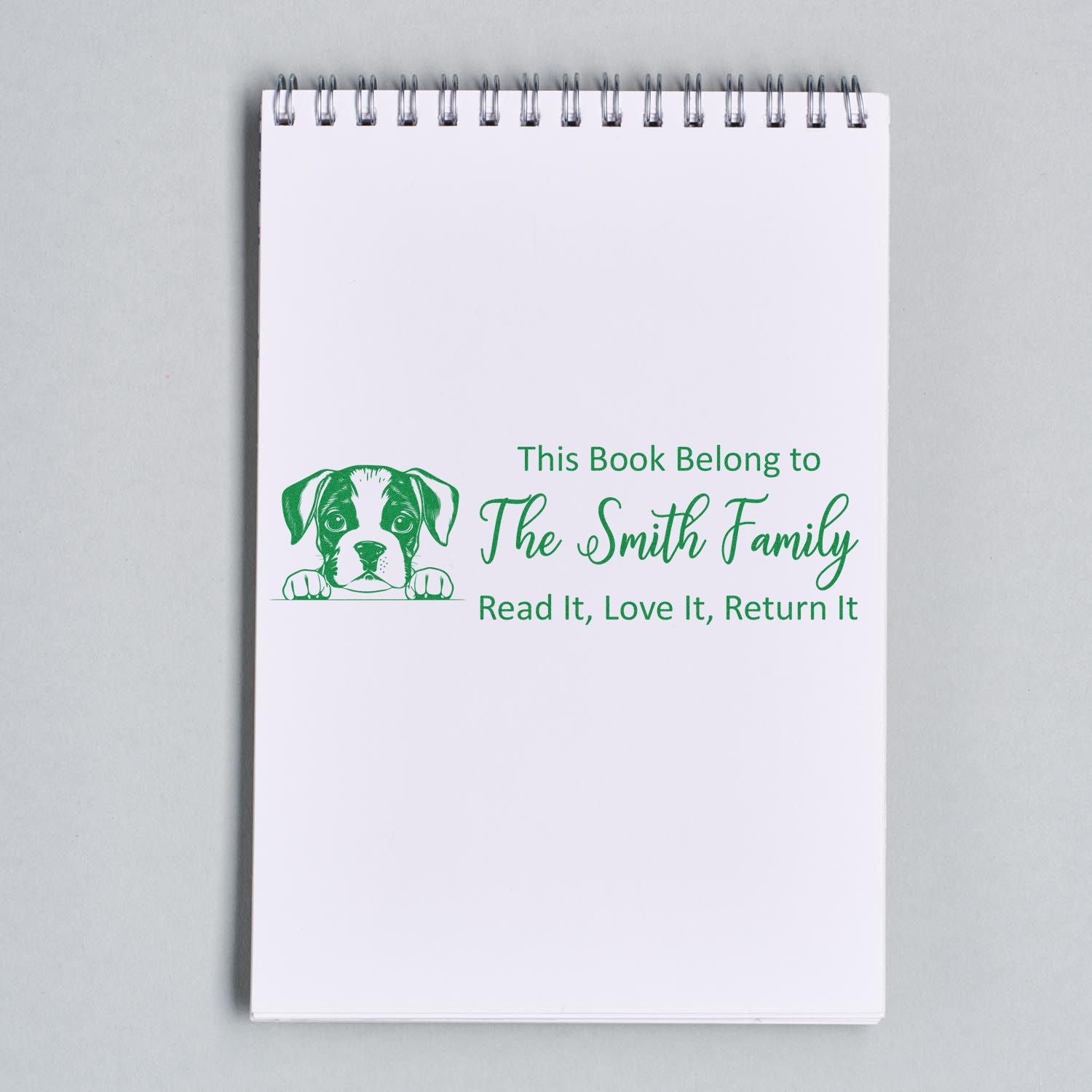 Custom rubber book stamp for The Smith Family with puppy design and Read It, Love It, Return It message.