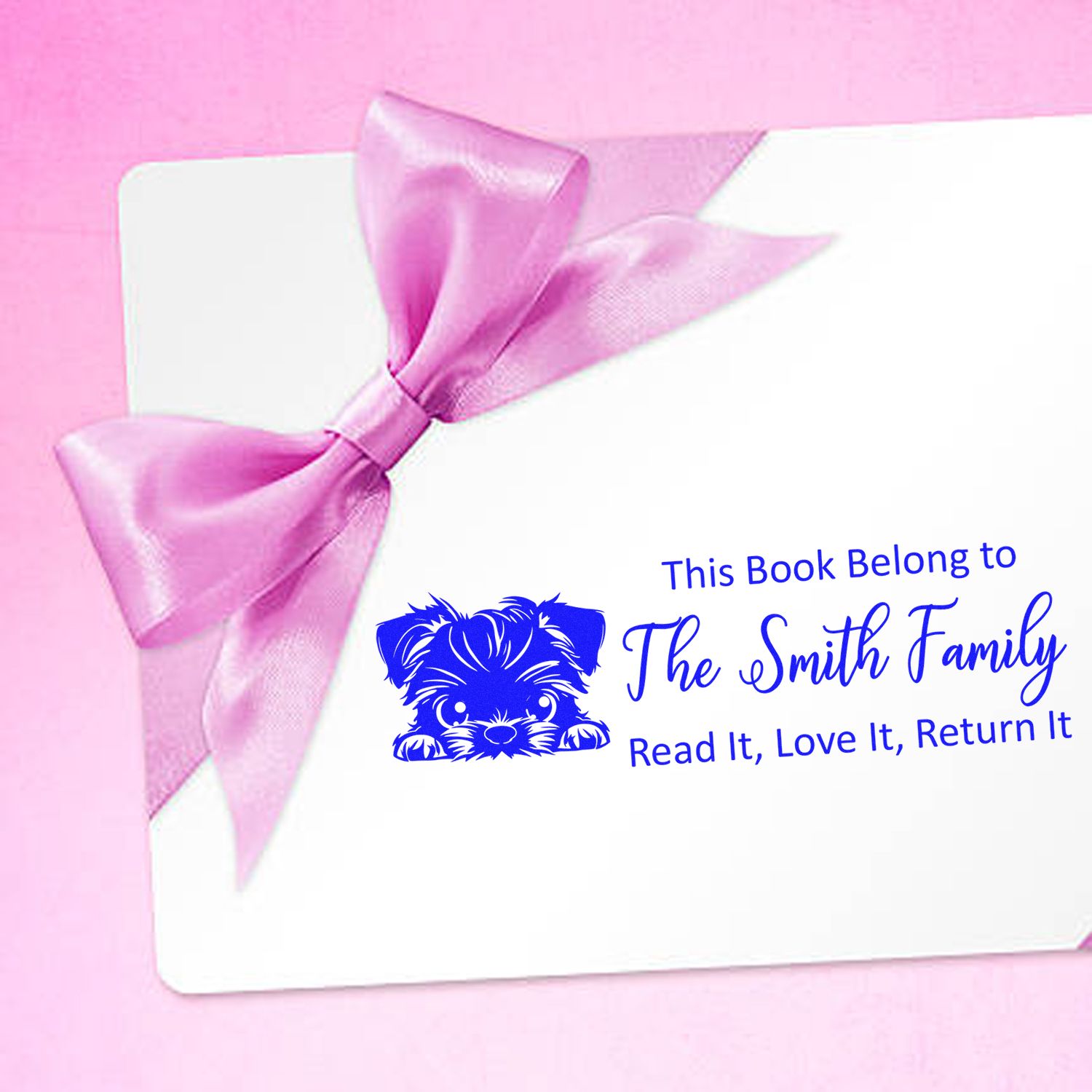 Personalized rubber book stamp with puppy design for The Smith Family library books, labeled Read It, Love It, Return It.