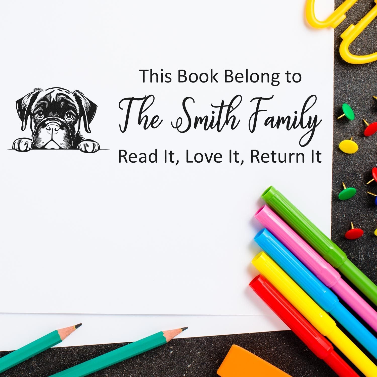 Custom personalized book stamp with dog design and This Book Belong to The Smith Family text for family library books.