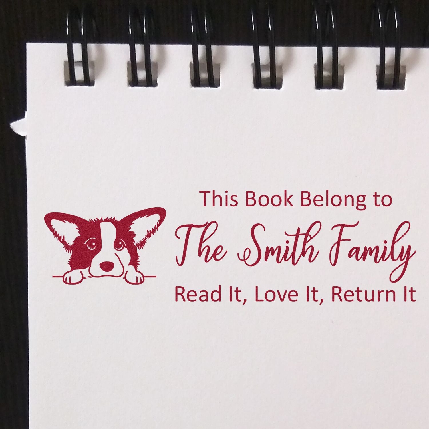 Custom rubber book stamp with corgi design for The Smith Family personal library.