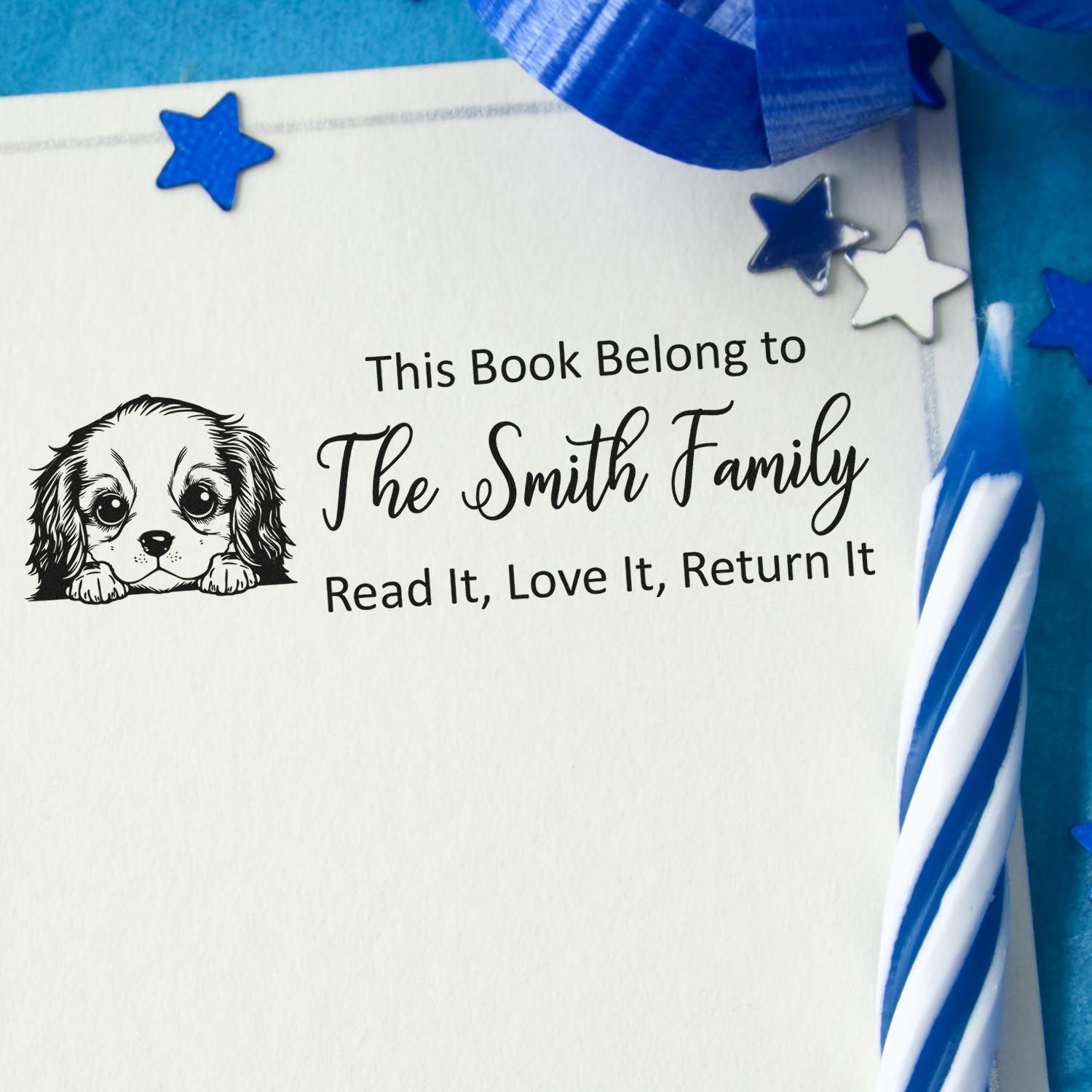 Personalized book stamp with puppy illustration and This Book Belong to The Smith Family return-it message.