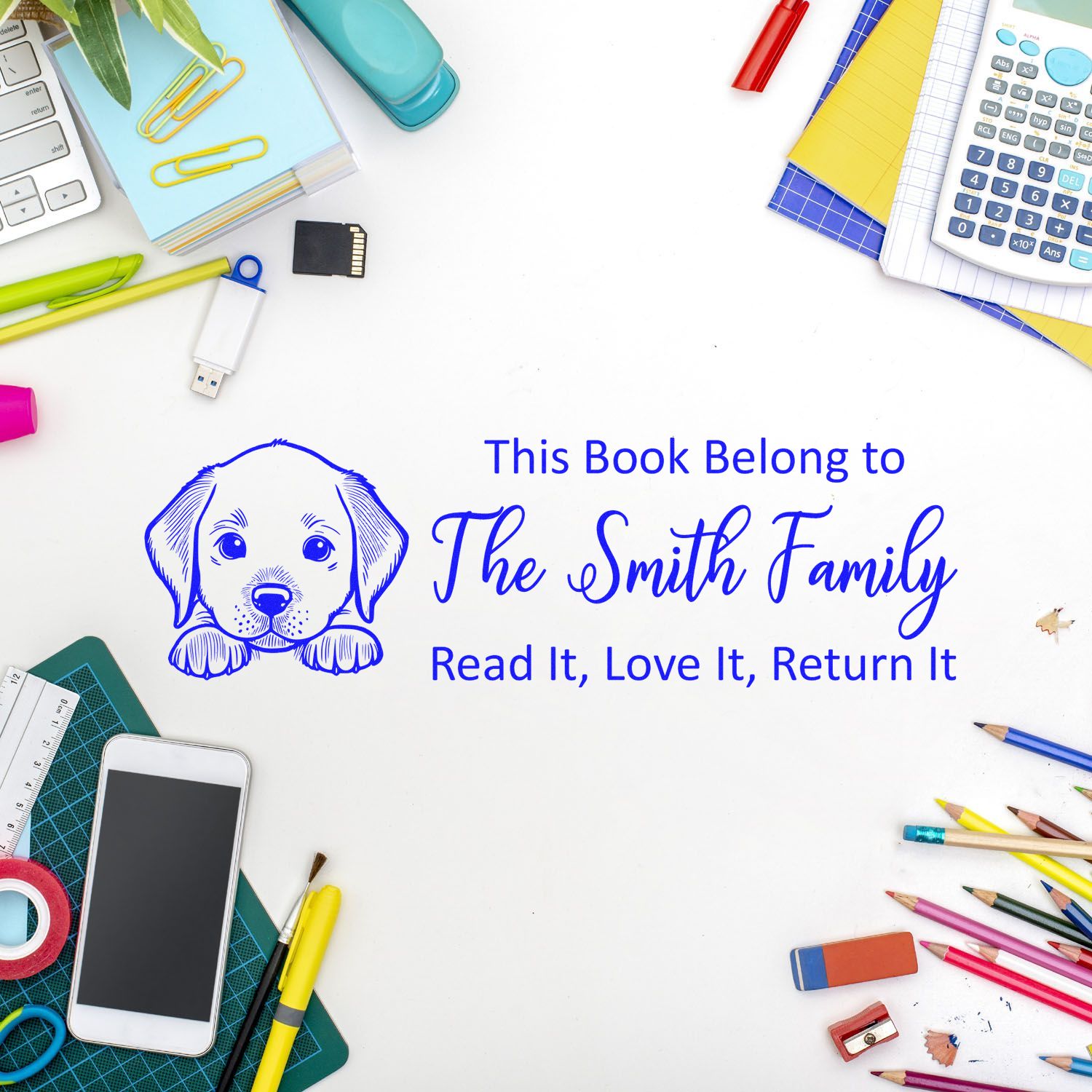 Personalized book ownership rubber stamp with puppy design and This Book Belongs to The Smith Family library return message