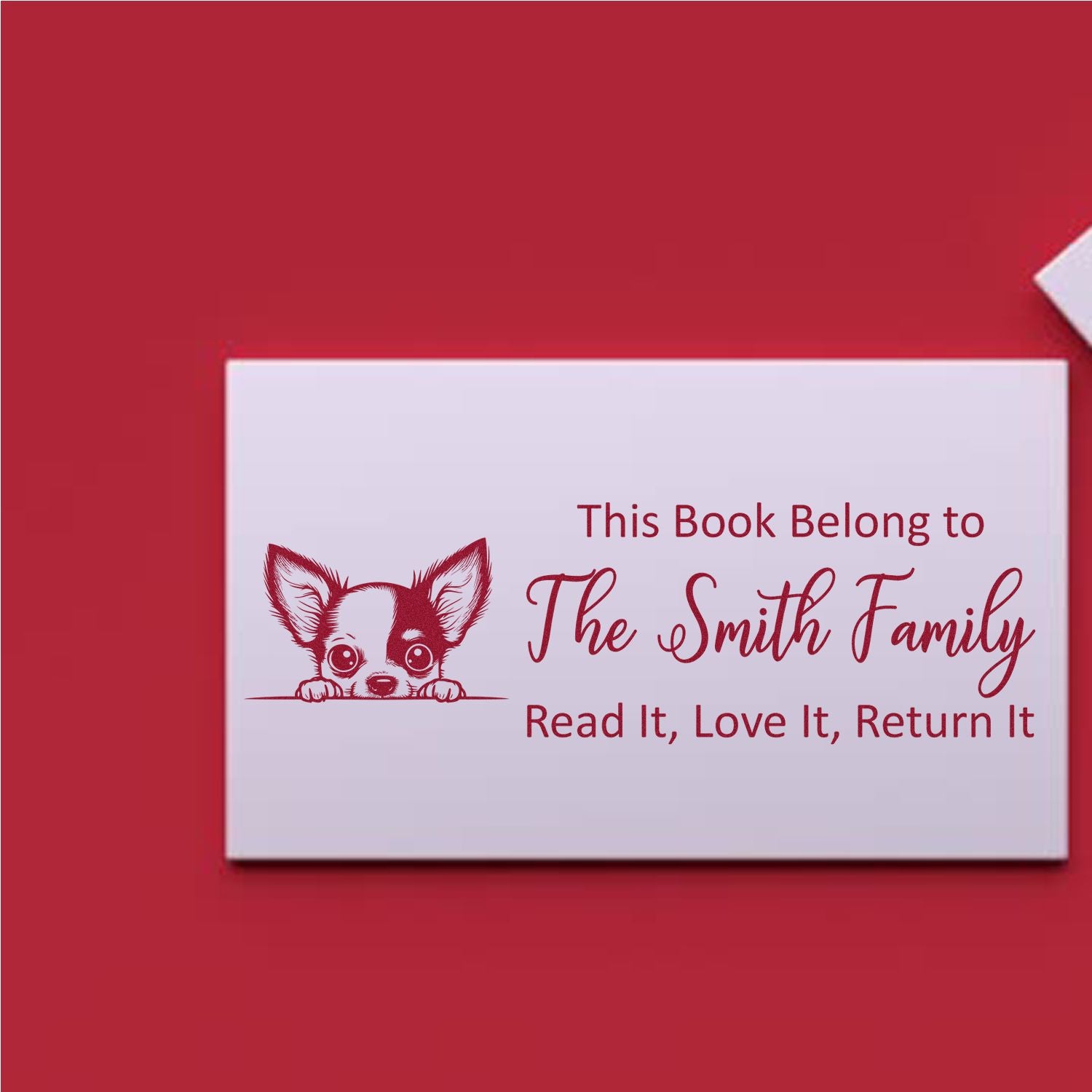 Personalized rubber stamp bookplate for The Smith Family with dog illustration and Read it, love it, return it message.