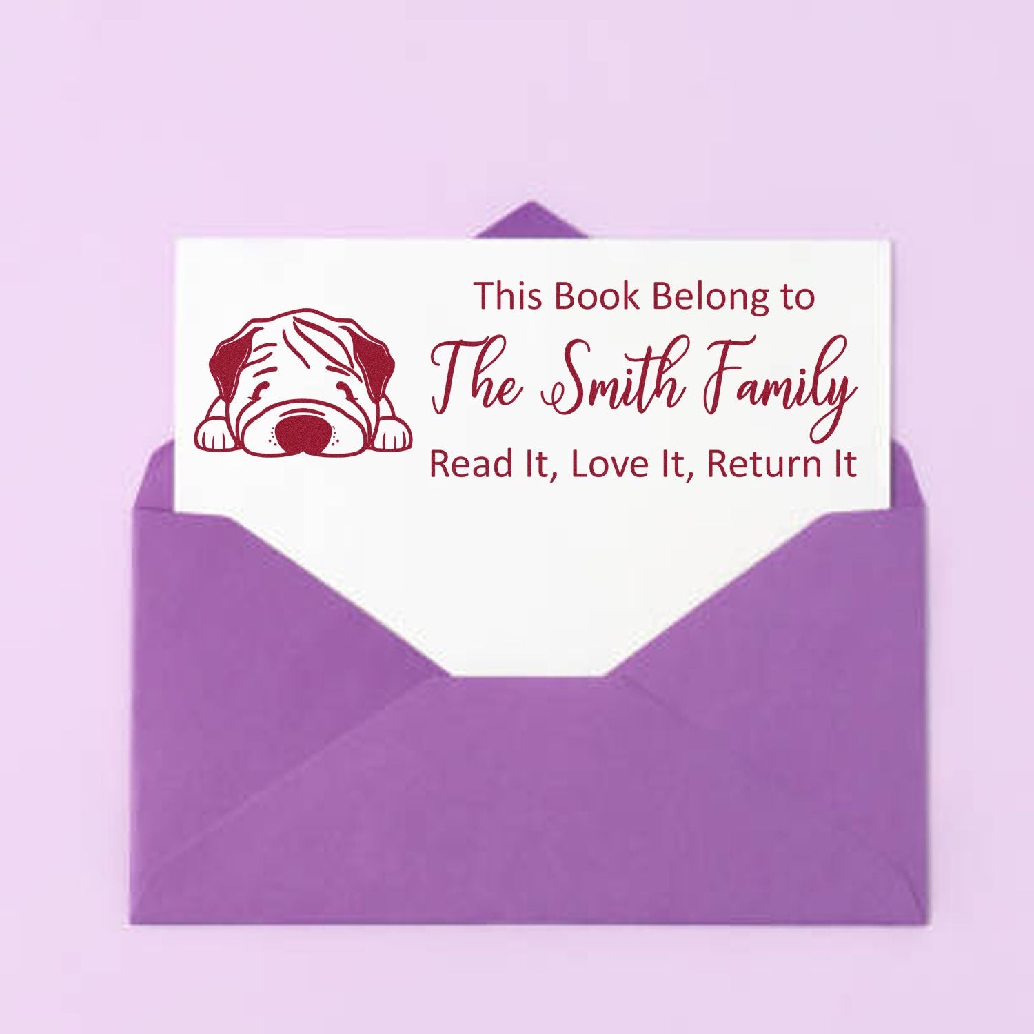 Custom book stamp with dog design for The Smith Family, marked Read It, Love It, Return It for personal library books.