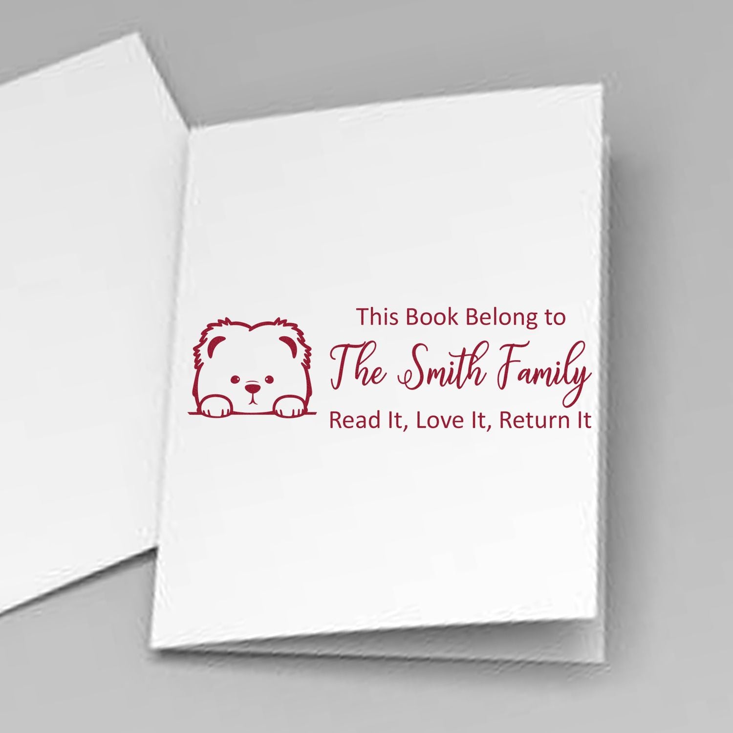 Personalized family bookplate rubber stamp for The Smith Family with bear icon and Read It, Love It, Return It.